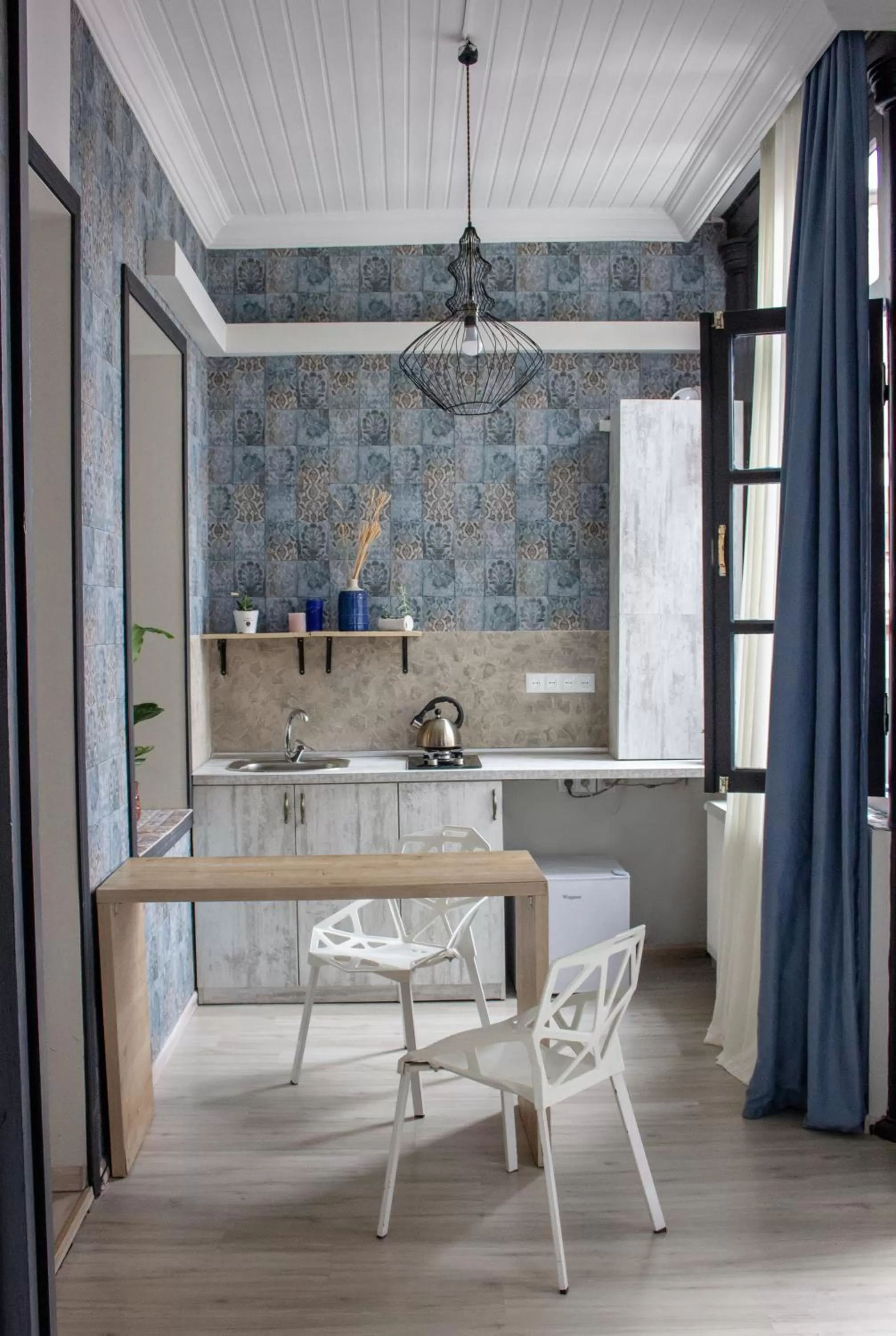 Kitchen or kitchenette in Check Point Hotel