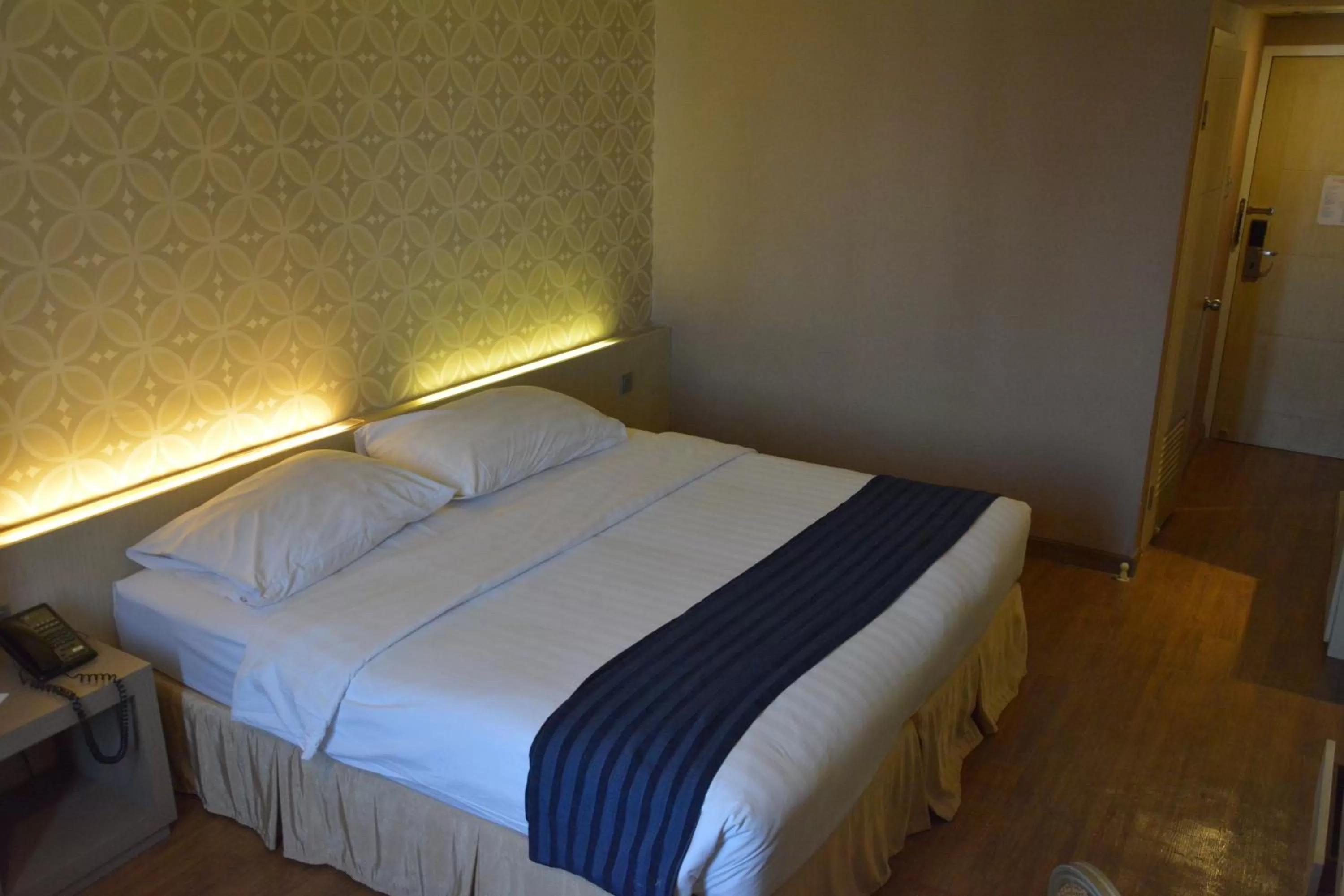 Bed in Garden Palace Hotel Powered by Archipelago