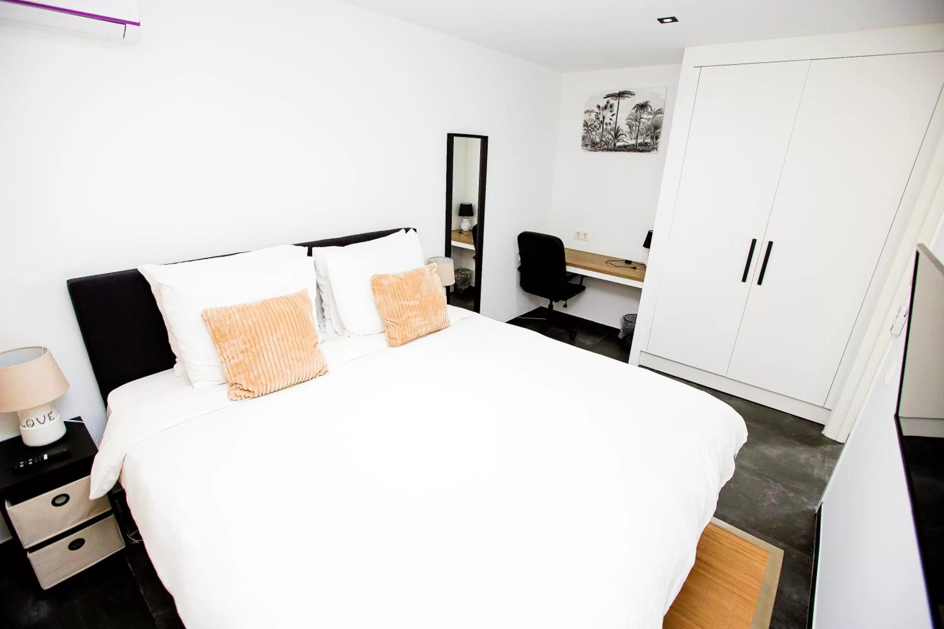 Bed in Bronbella Villa Residence