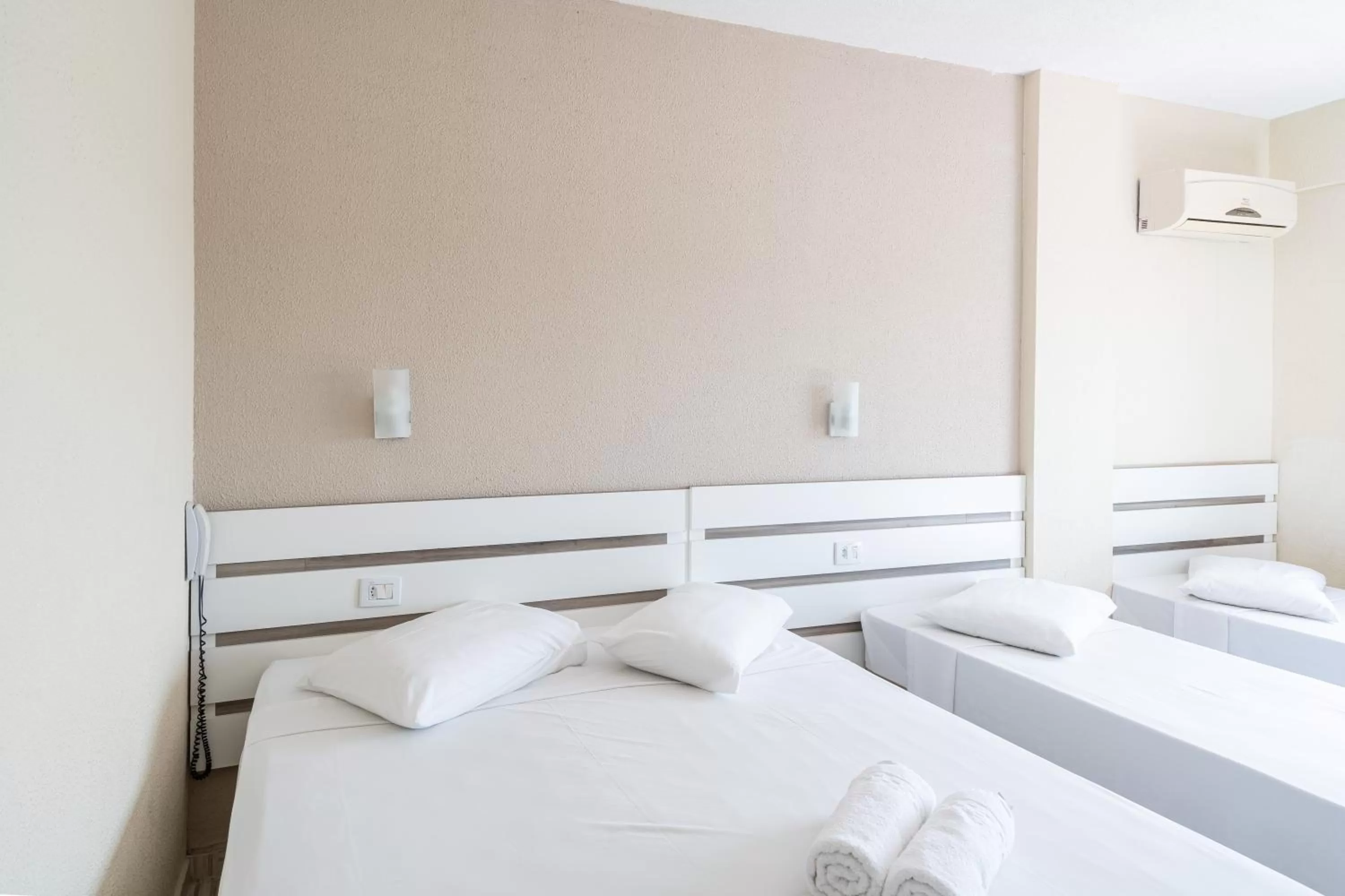 Bed in Hotel Conexão