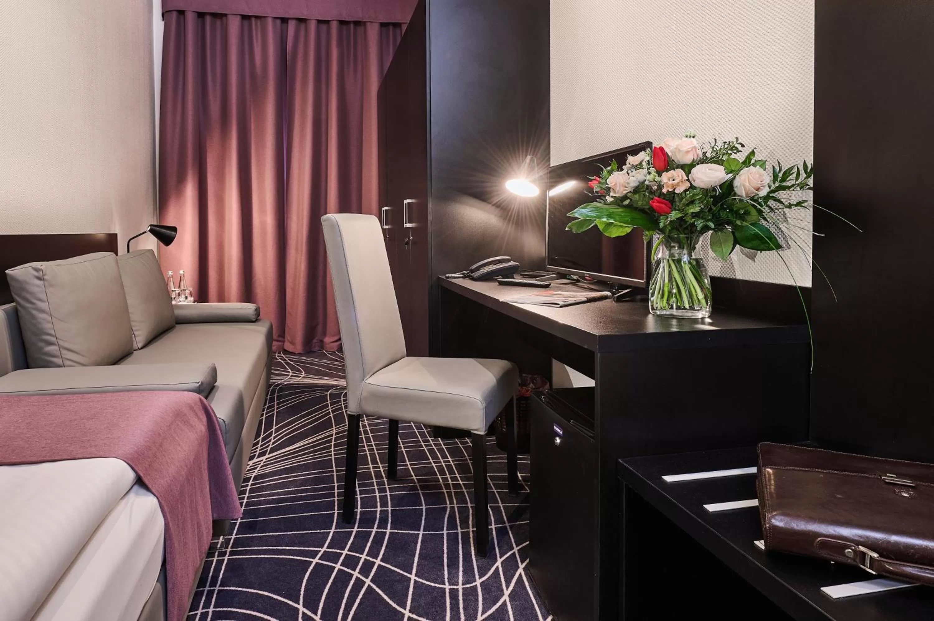 Living room in Sky Business Hotel