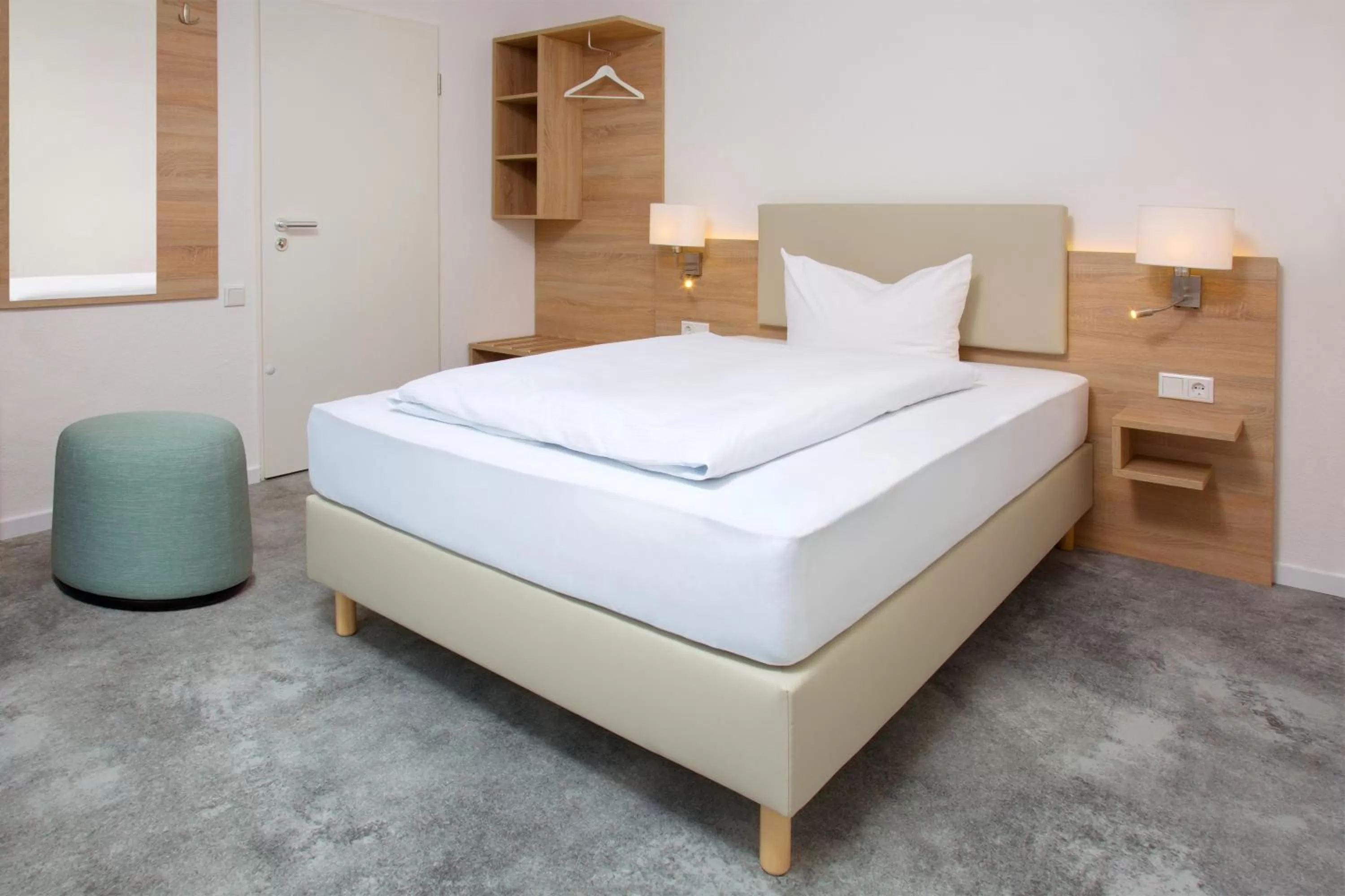 Photo of the whole room, Bed in Parkhotel Lippstadt