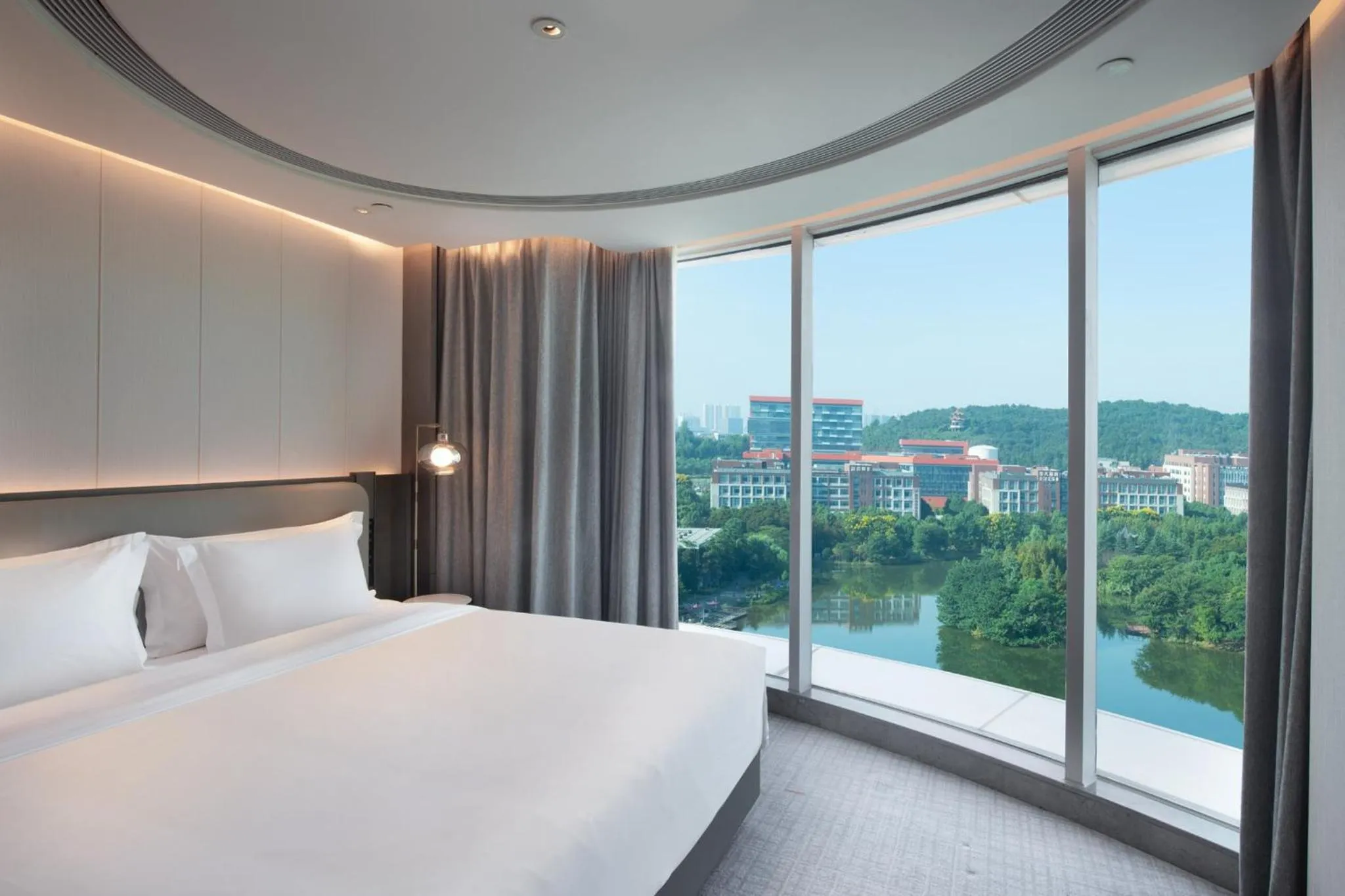 Photo of the whole room, Bed in Crowne Plaza Wuhan Optics Valley by IHG