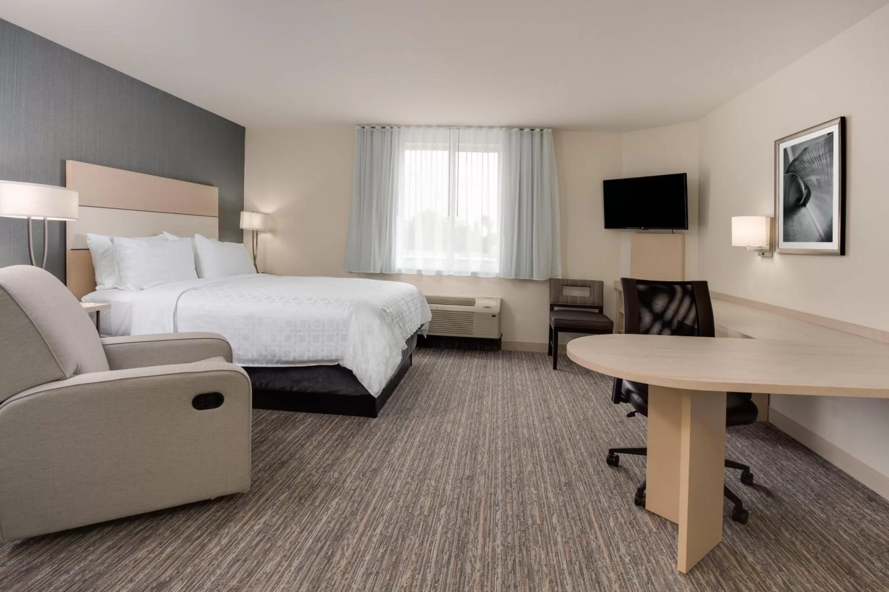 Photo of the whole room, Bed in Candlewood Suites Miami Intl Airport - 36th St by IHG