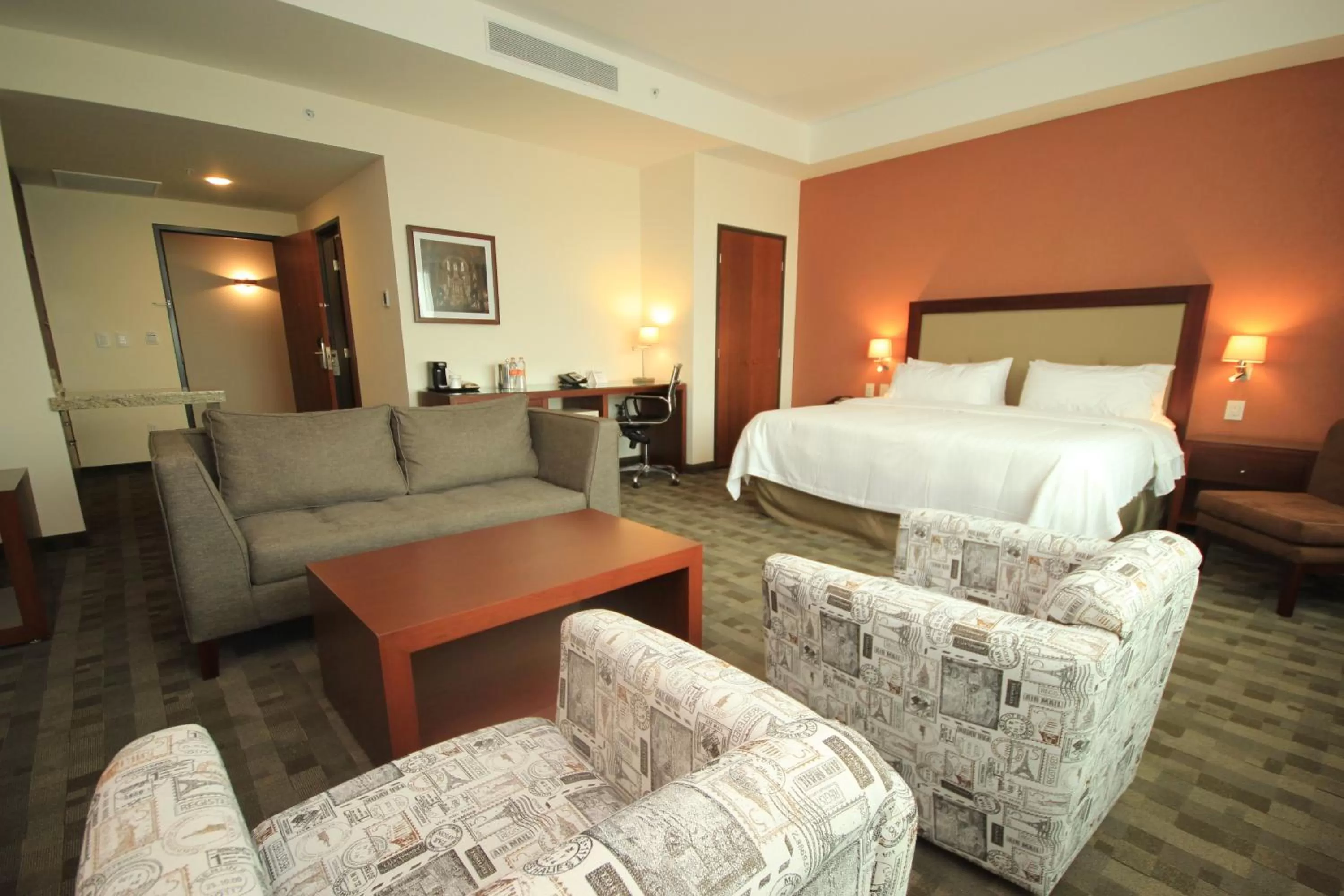 Photo of the whole room, Bed in Holiday Inn & Suites Plaza Mayor by IHG