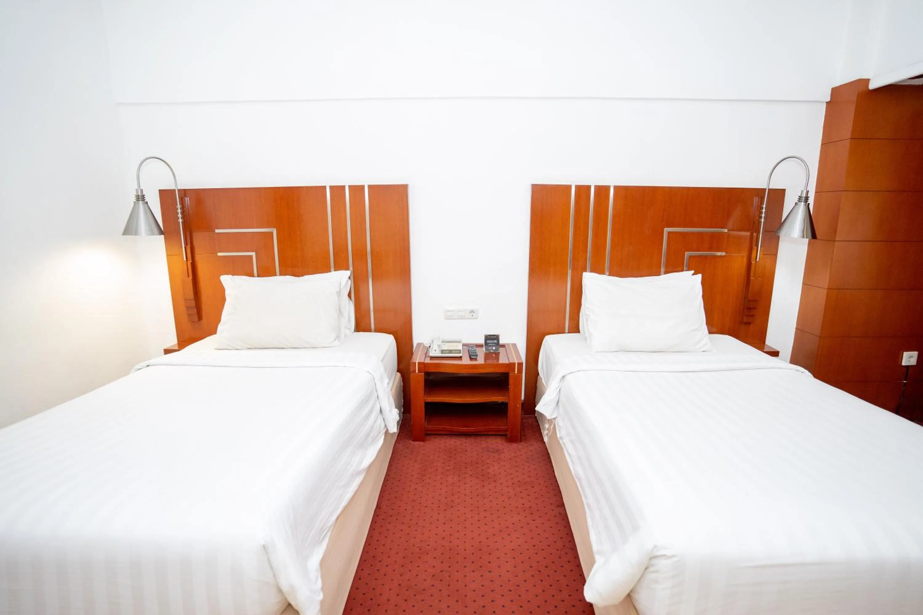 Bed in Hotel Savoy Homann