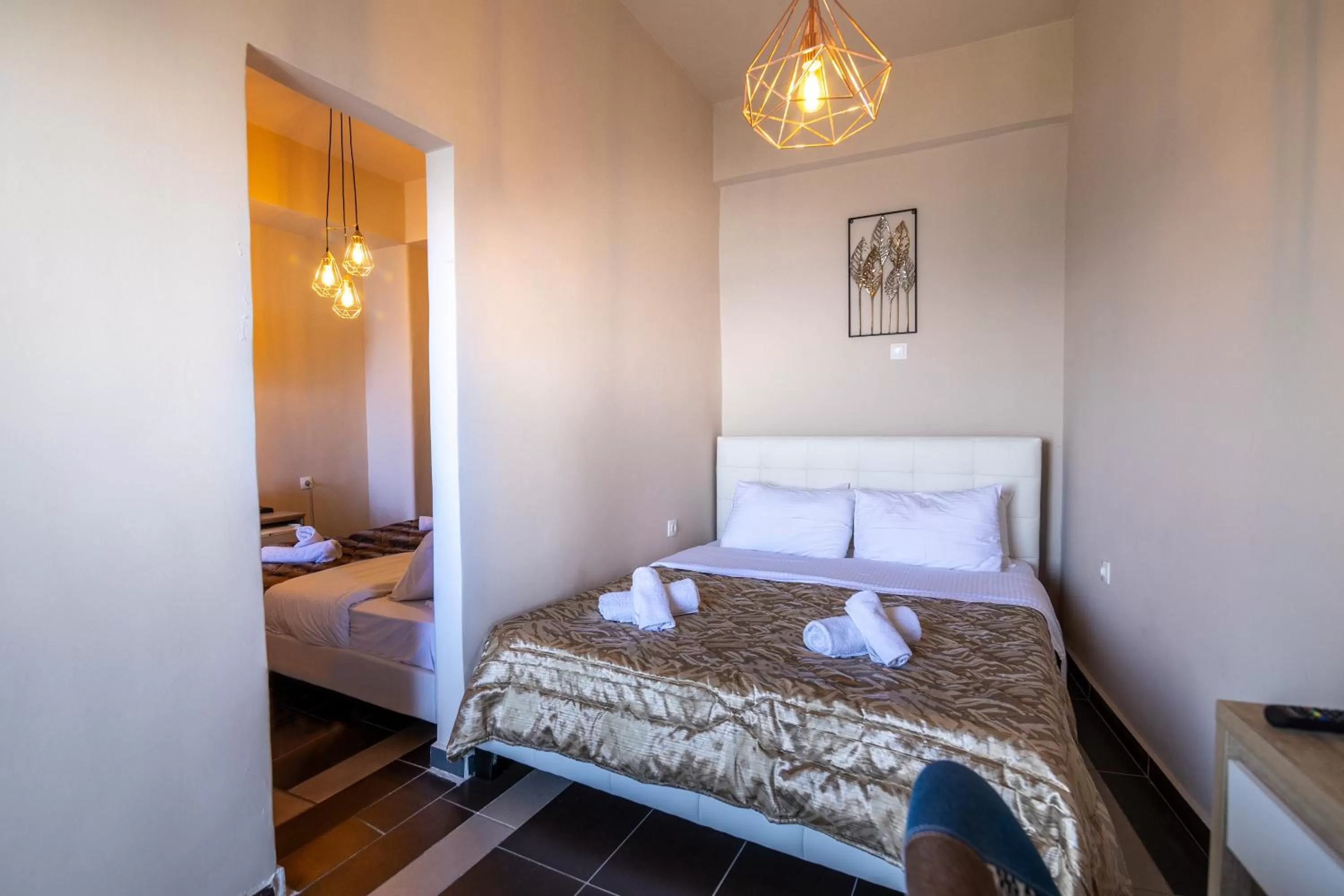 Bed in Votsalakia Hotel & Luxury Apartments