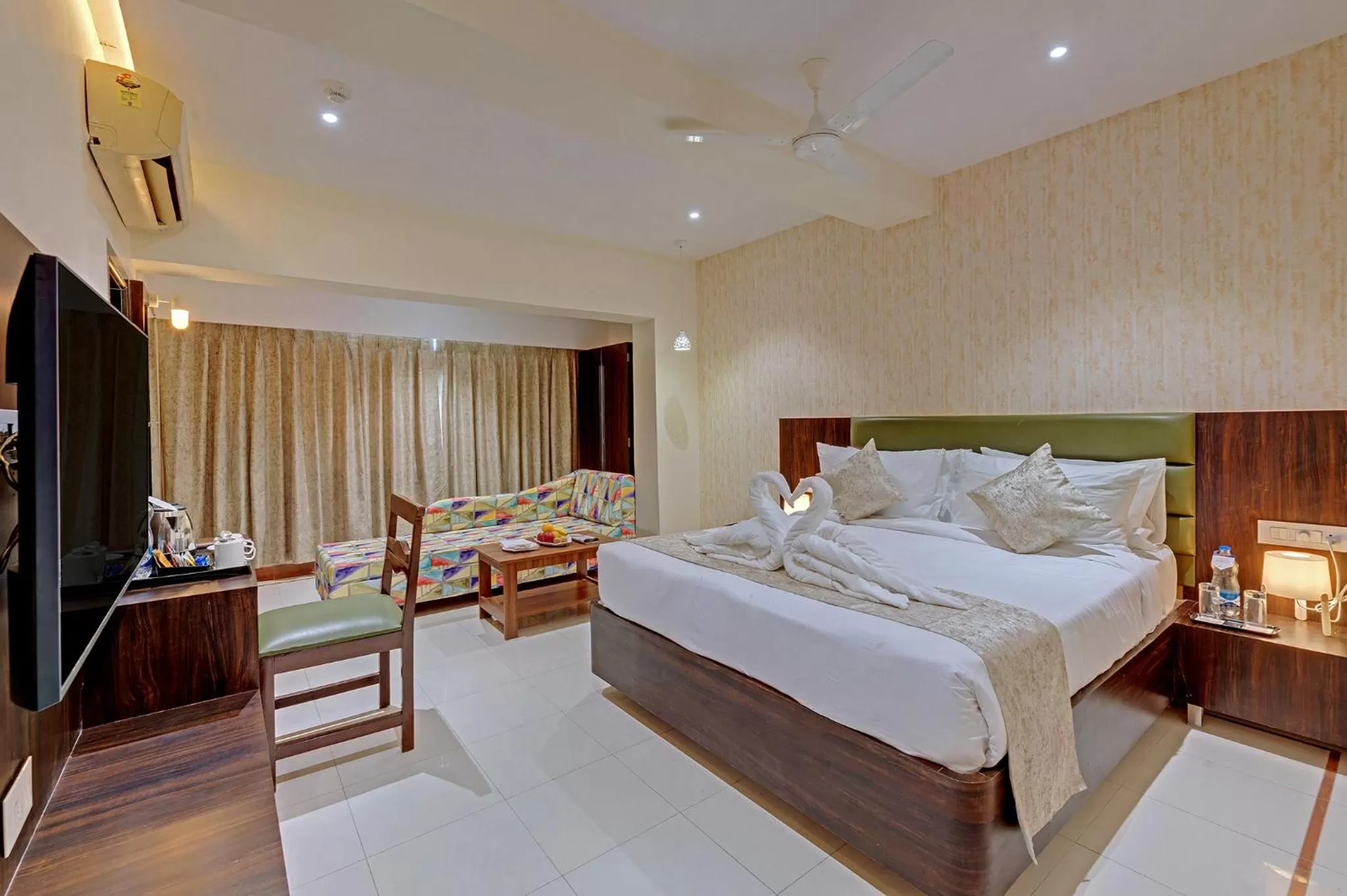Living room, Bed in Guruprerna Beacon Resort, Dwarka