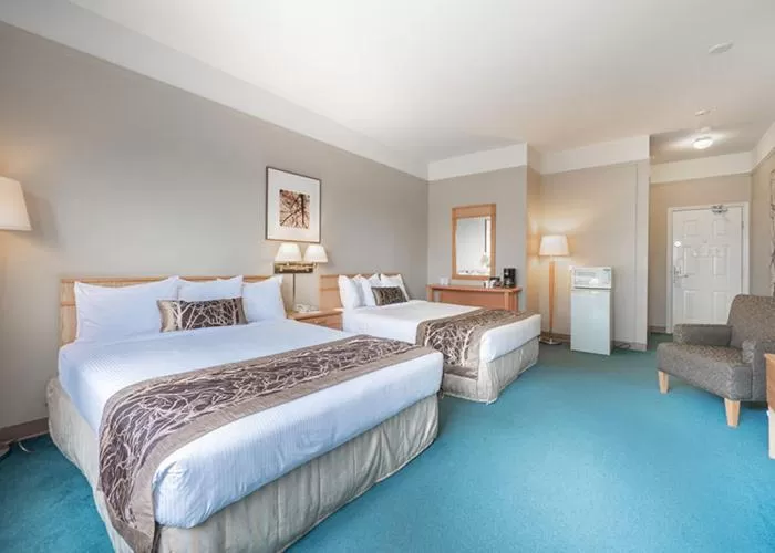 Bed in The Cedars Inn Hotel & Convention Centre