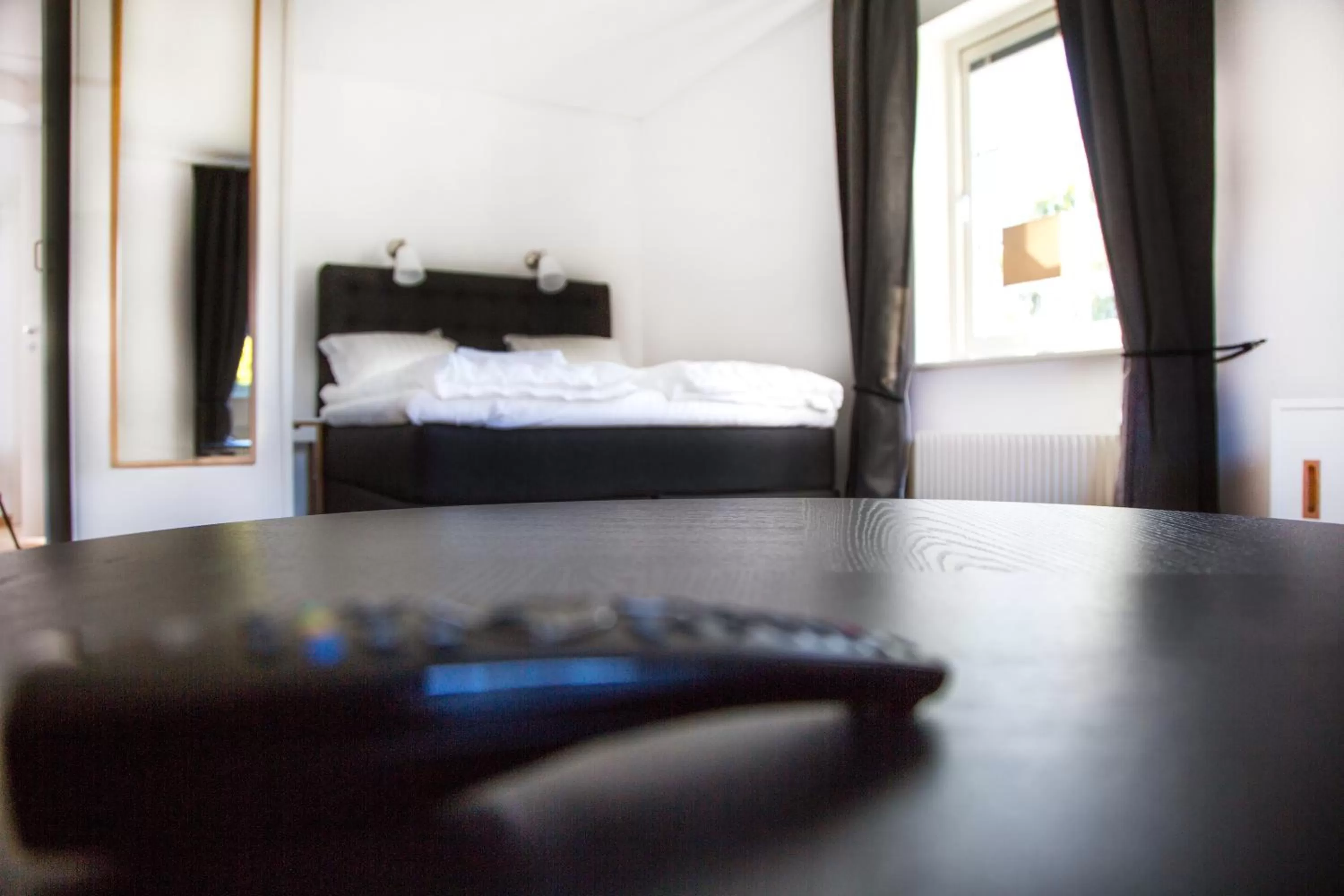 Living room, Bed in Easy Livin' Apartment Hotel