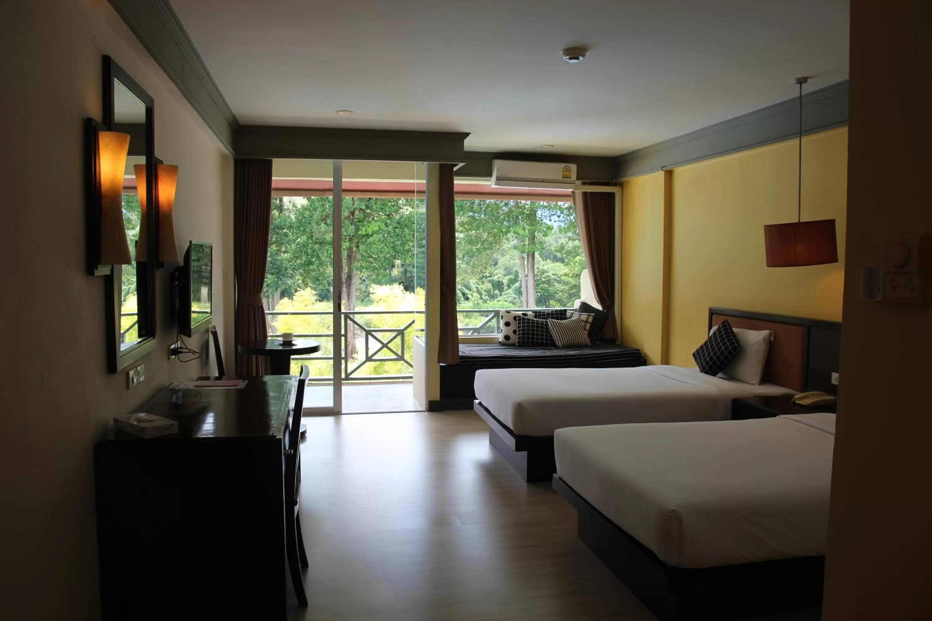 Photo of the whole room, Bed in Aekpailin River Kwai Resort