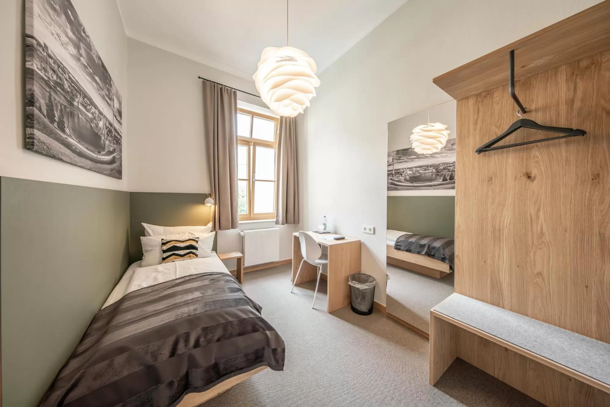 Seating area, Bed in Hotel Am Markt