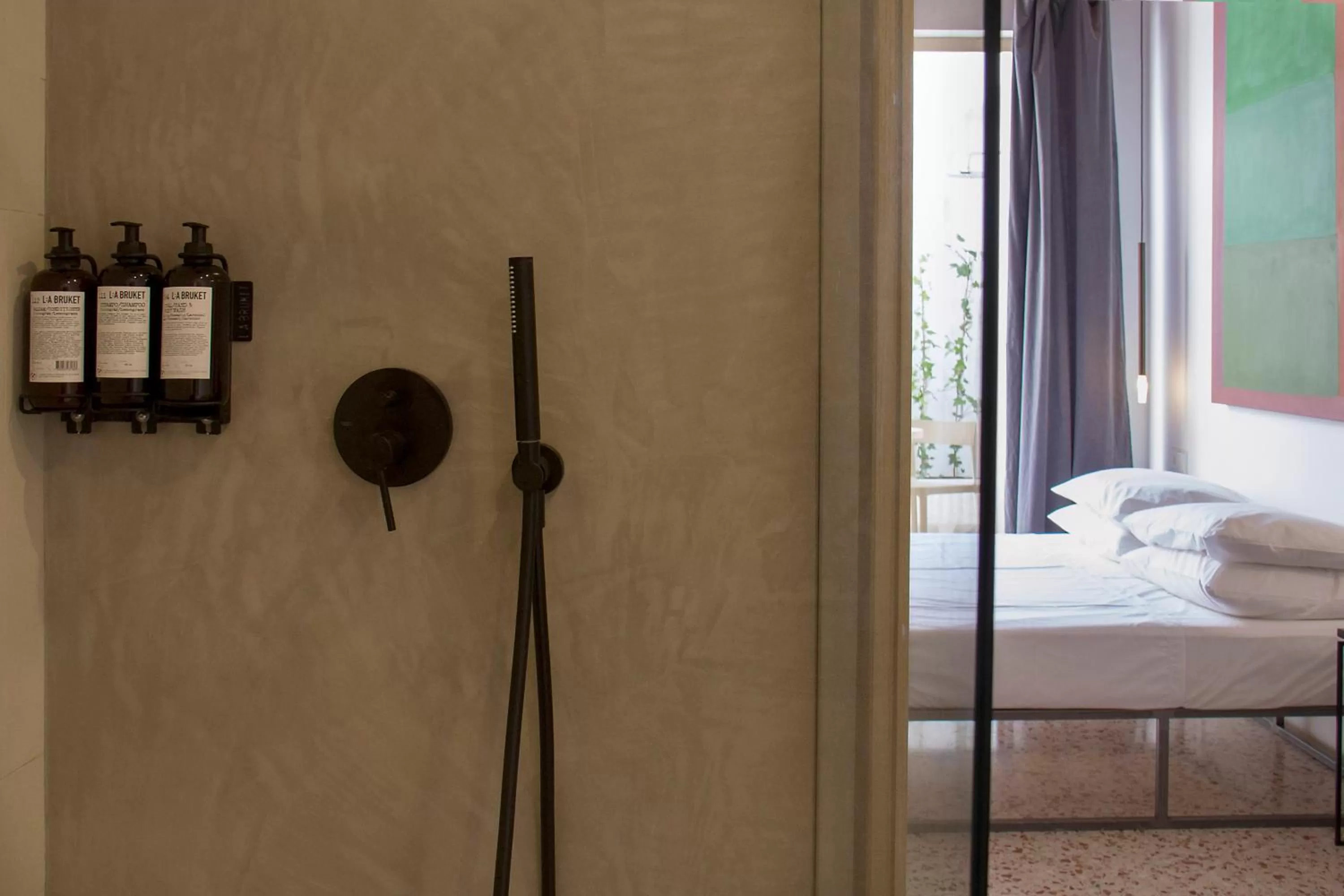 Bathroom, Bed in Fragile Hotel