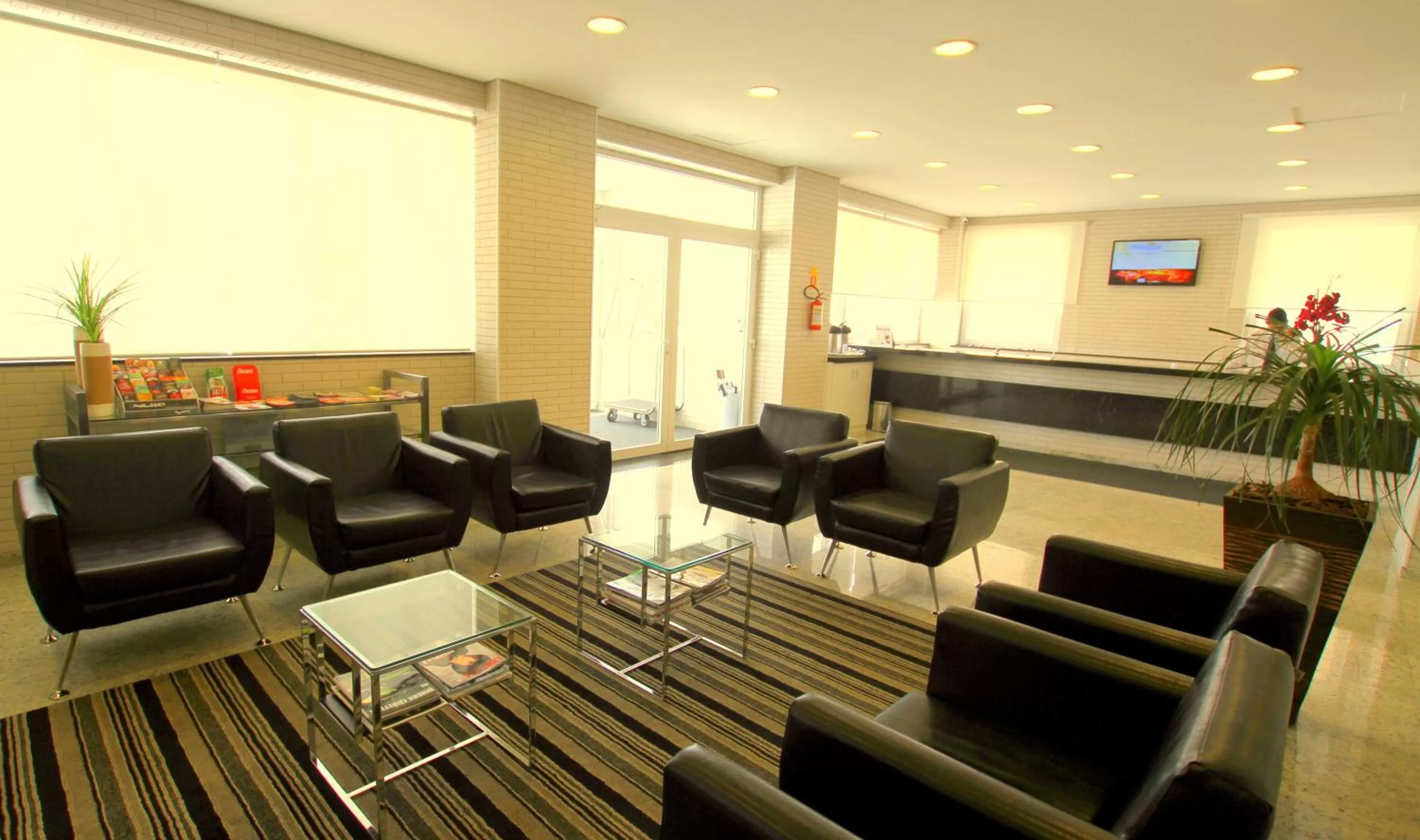 Lobby or reception in Hotel Confiance Centro Cívico