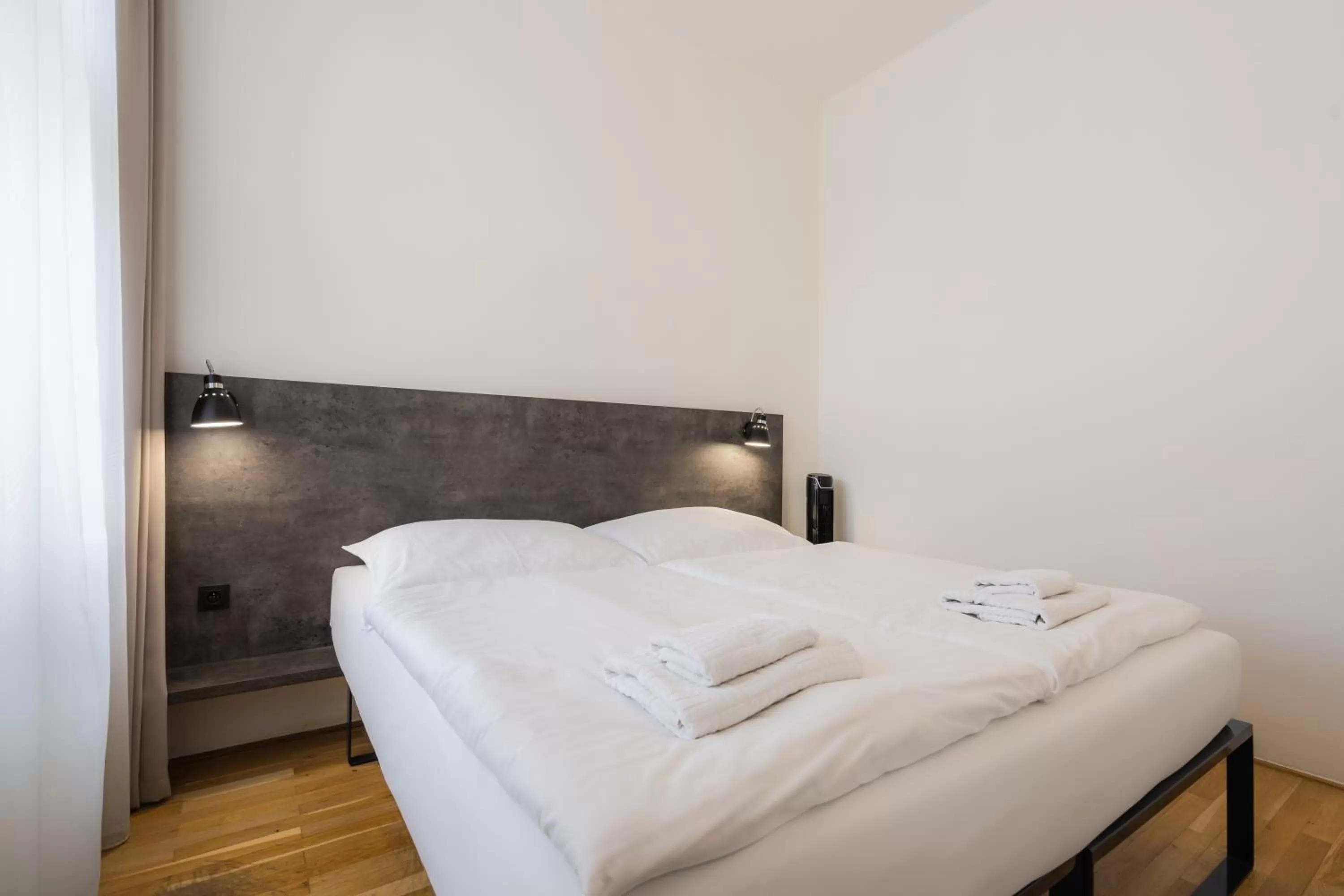 Bed in EA ApartHotel Melantrich