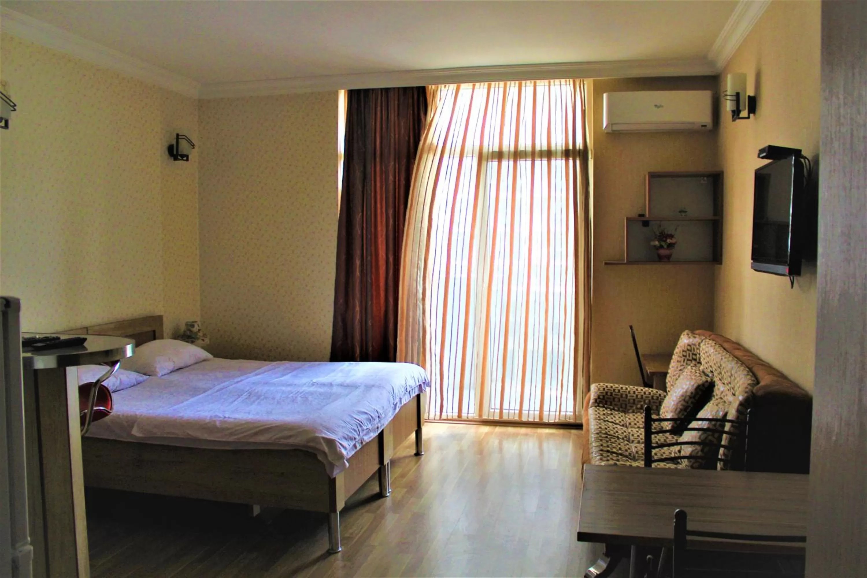 Bed in Orbi Lux Apartment