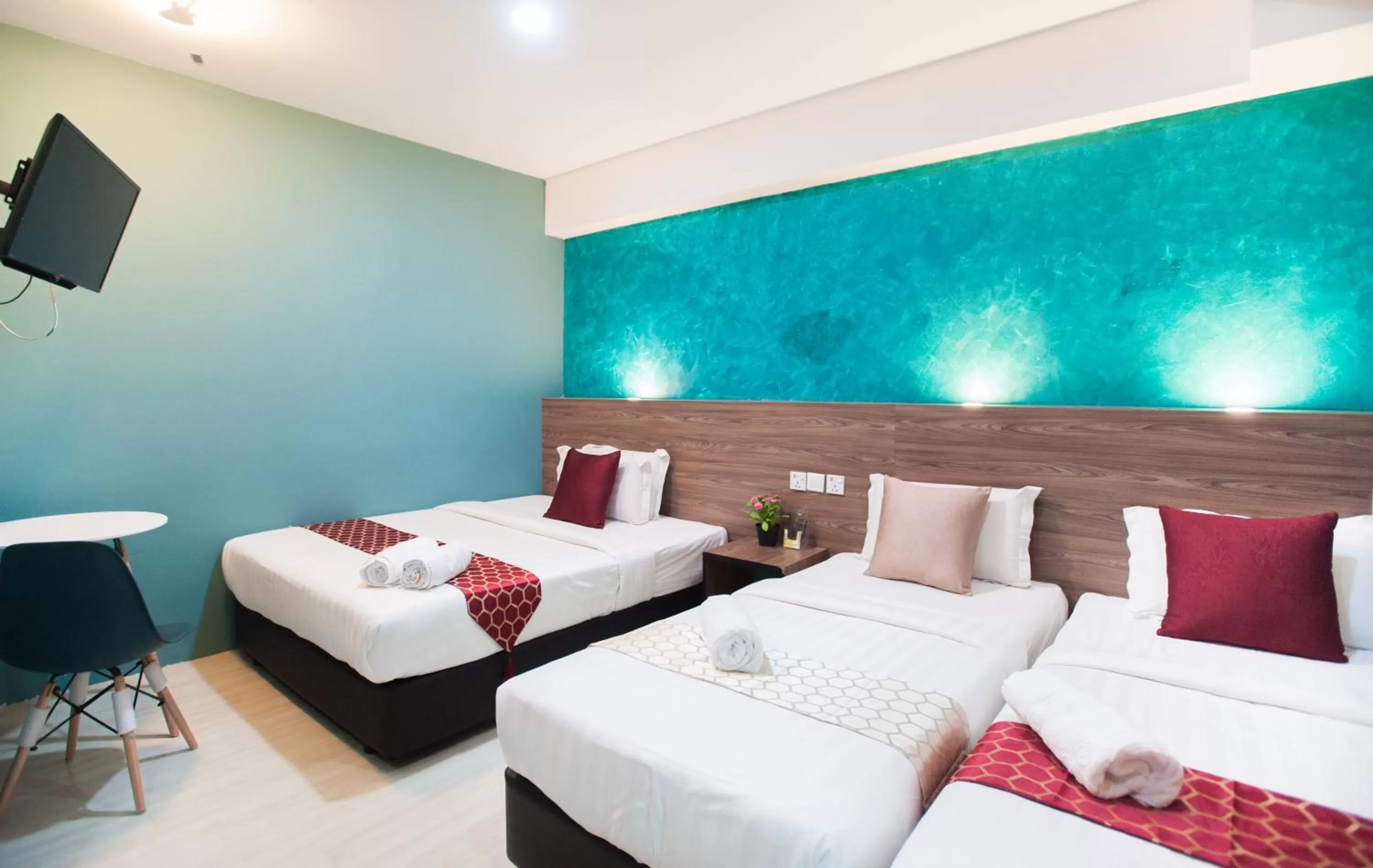 Bed in DJ Citi Point Hotel