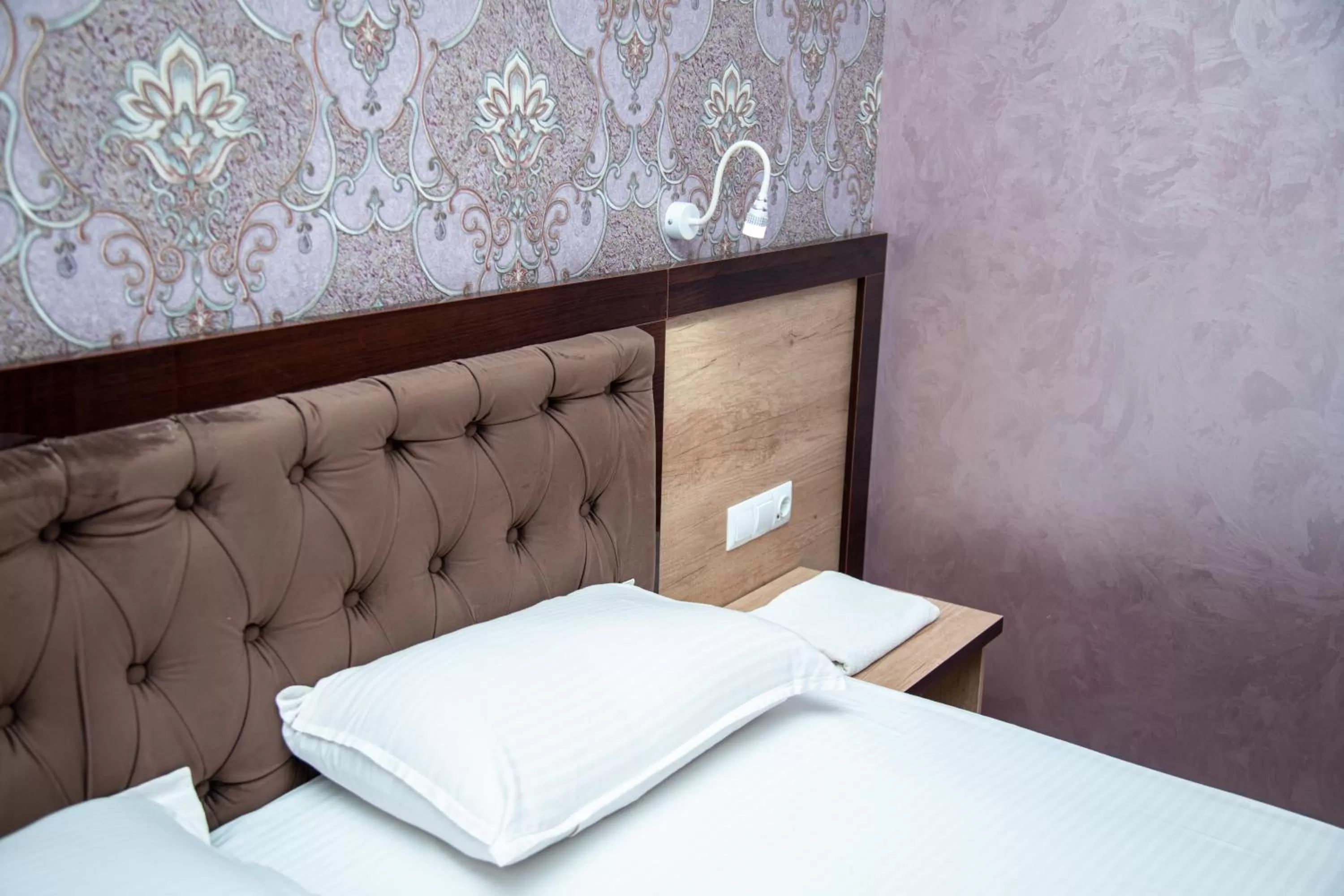 Bed in Armon Apart Hotel