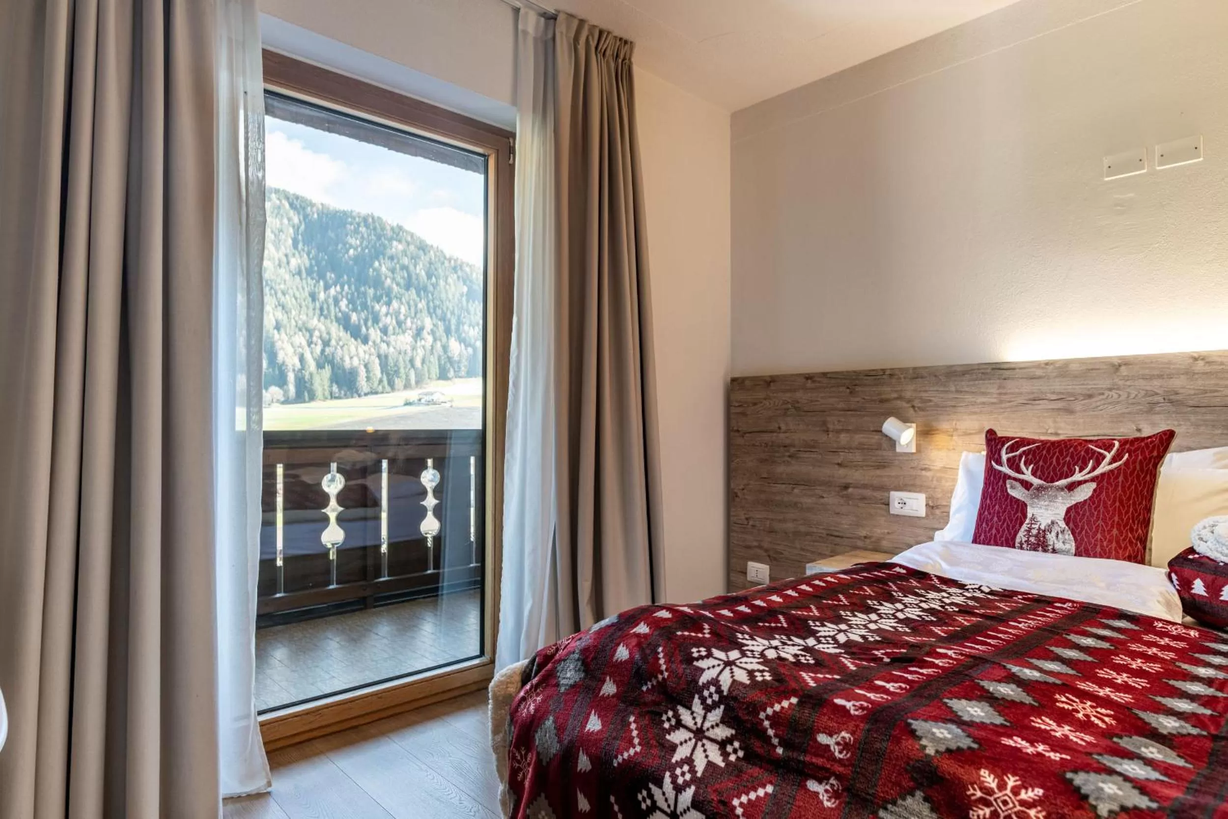 Bed in Hotel Kronplatzer Hof