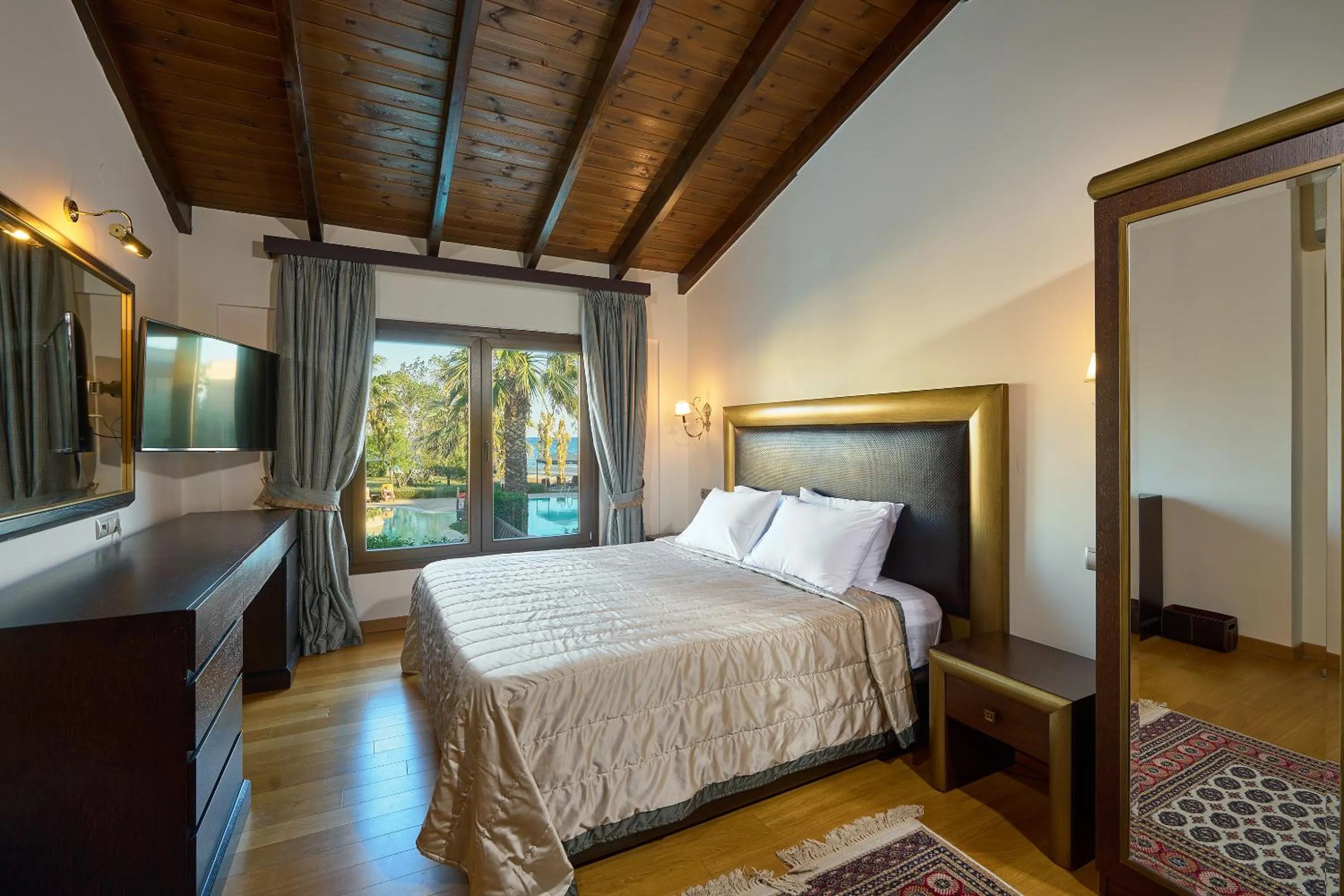 Bed in Mediterranean Village Hotel & Spa