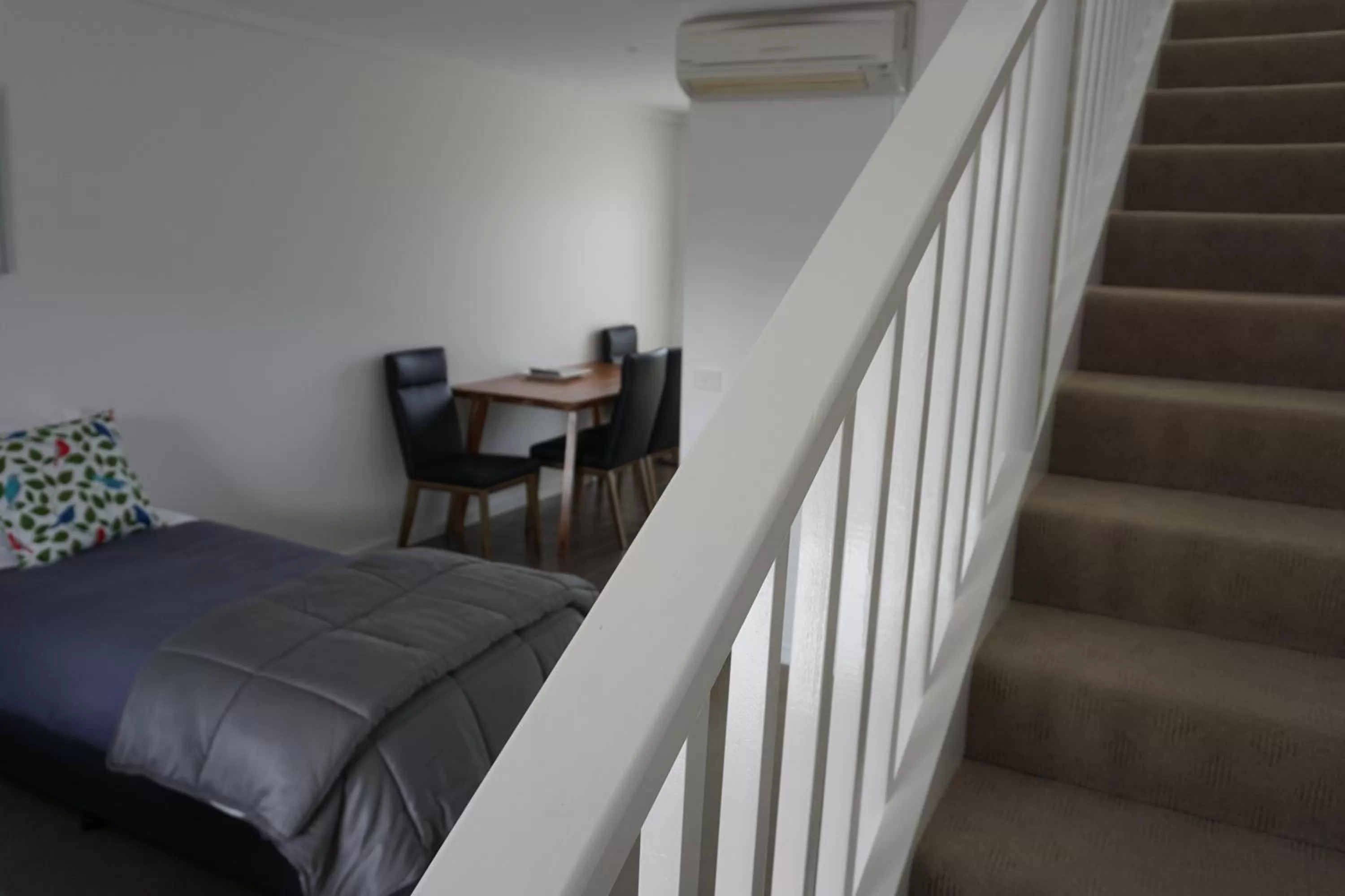 Bed in Ashmont Motel and Apartments