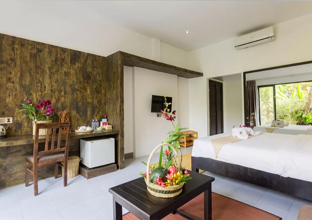 Bed in Ladear Privilege Rooms