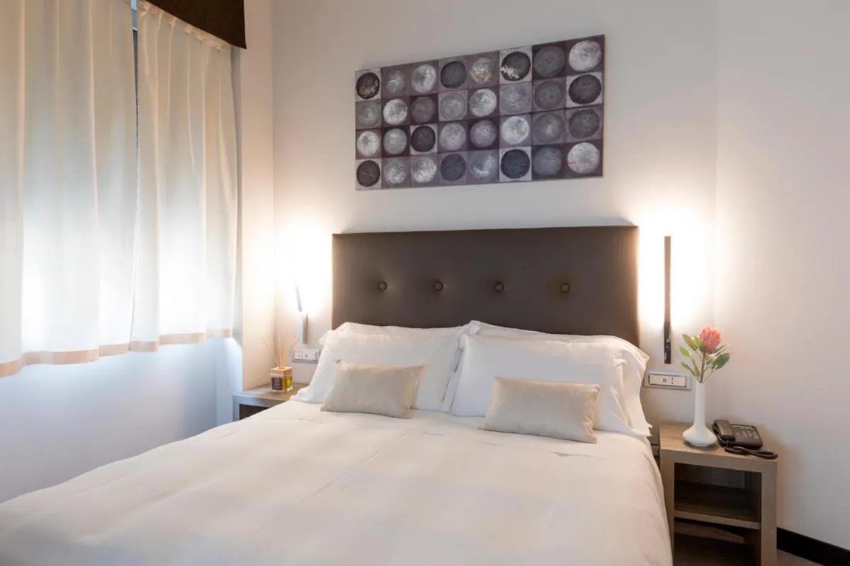 Photo of the whole room, Bed in Hotel Mentana, by R Collection Hotels