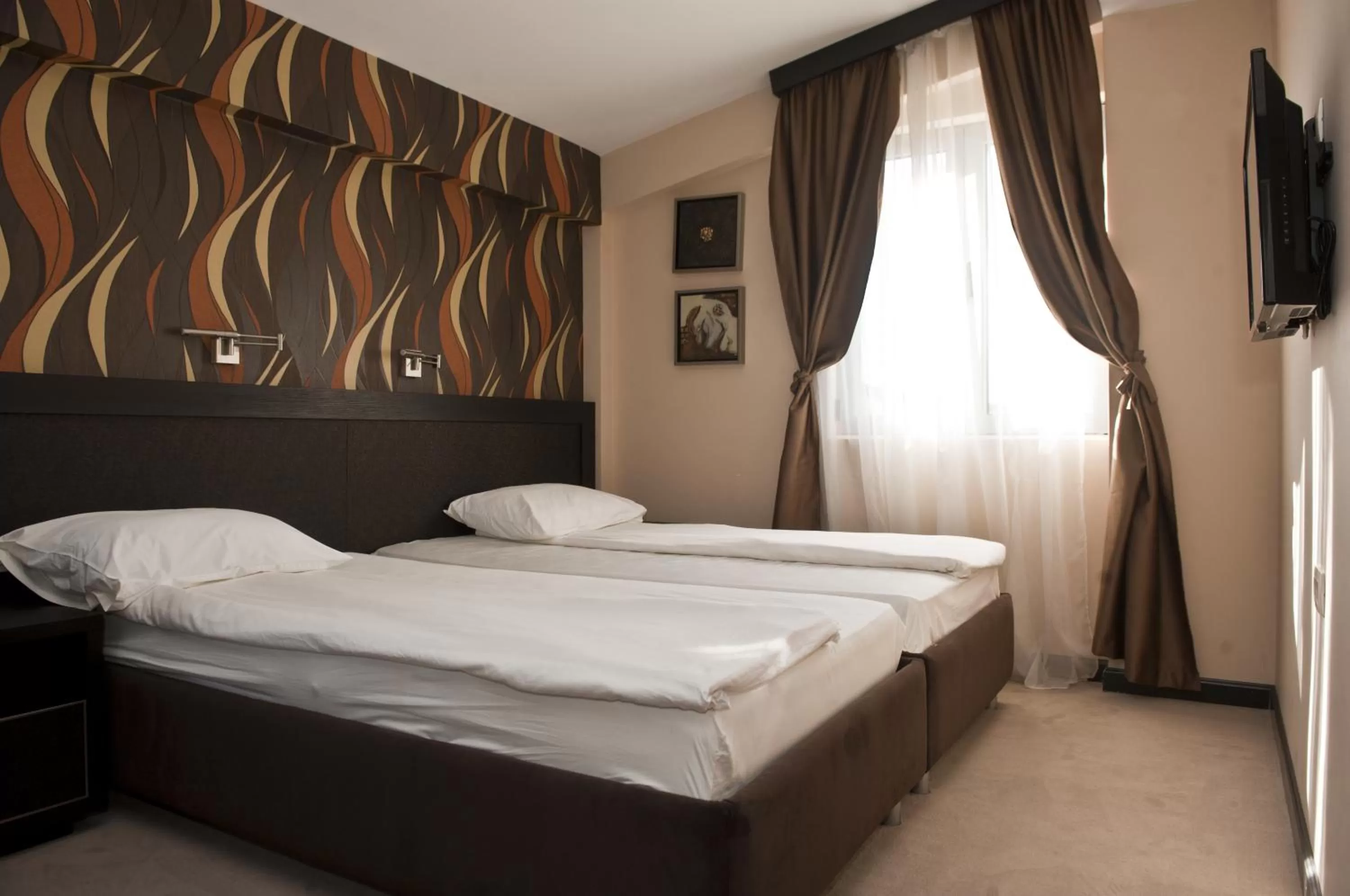 Bed in Hotel Crnogorska Kuća