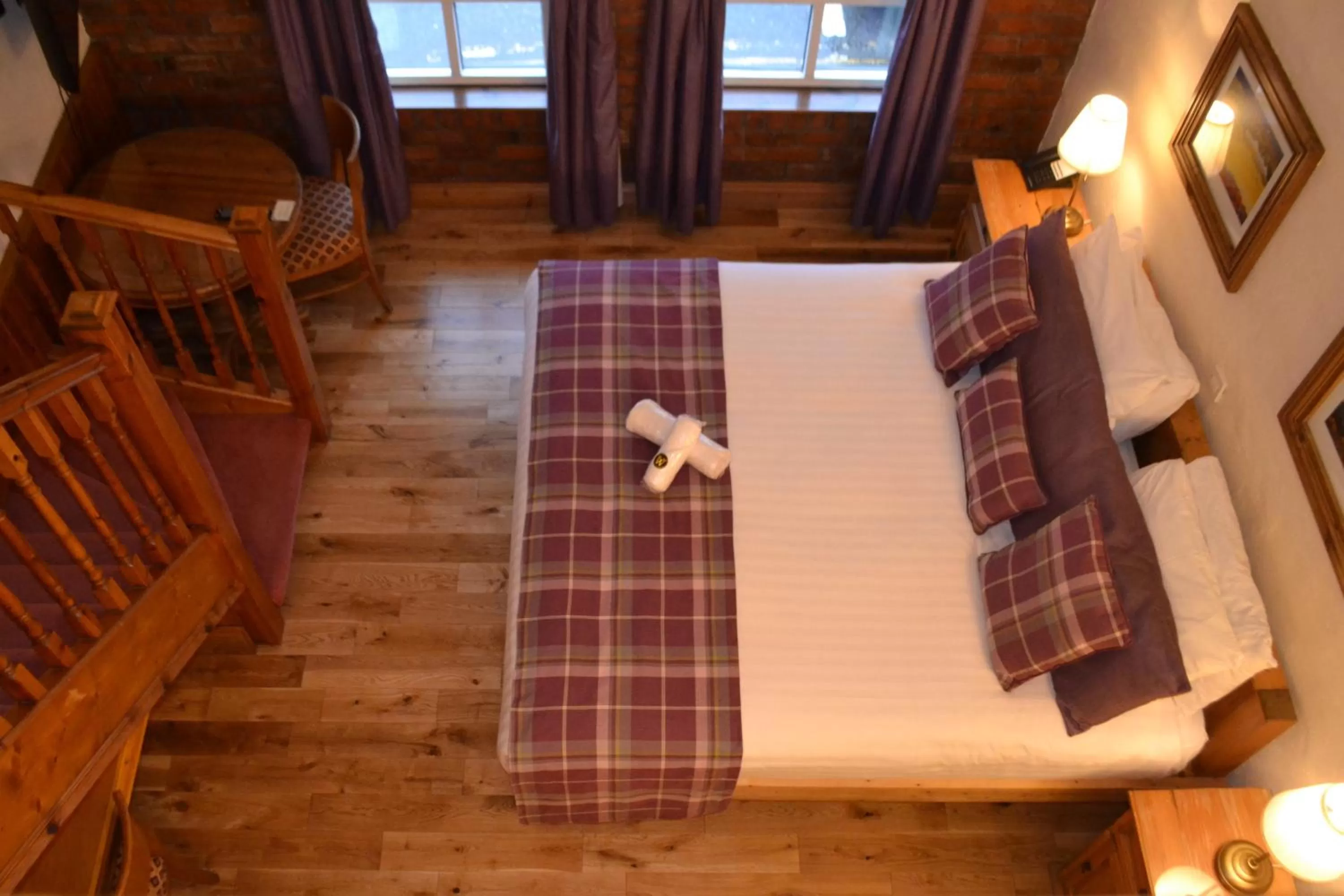 Bed in Walsh's Hotel and Apartments