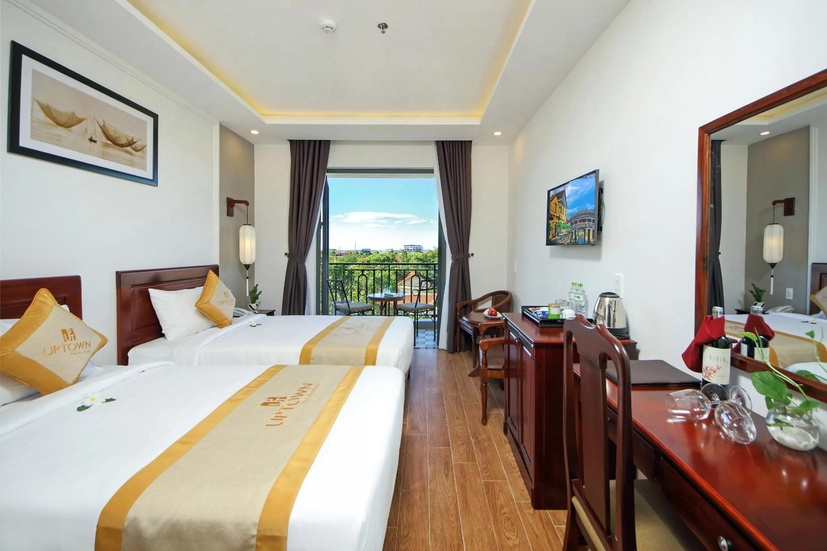 Photo of the whole room, Bed in Uptown Hoi An Hotel & Spa