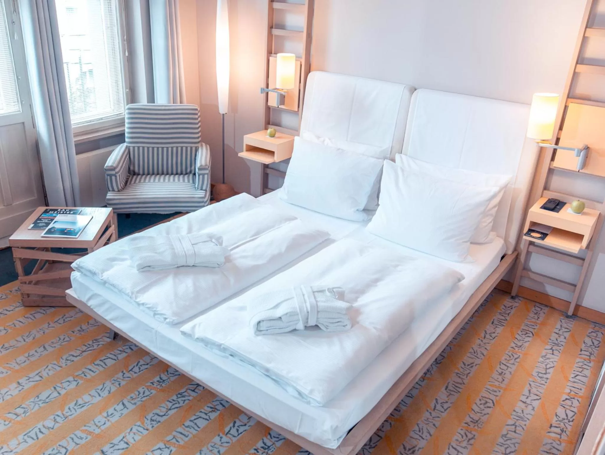 Bed in Hotel Bleibtreu Berlin by Golden Tulip