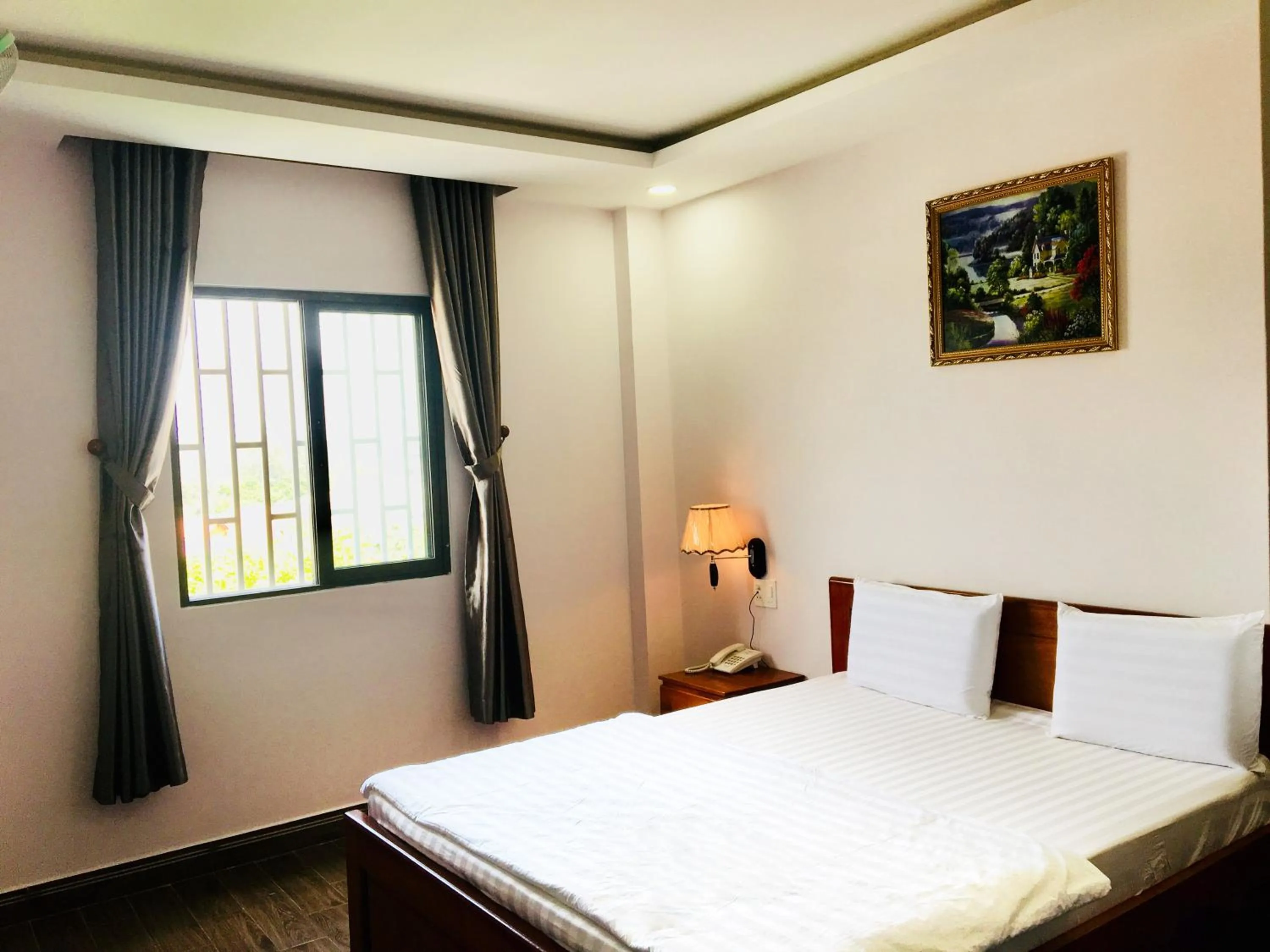 Bed in QUEEN VICTORIA Hotel