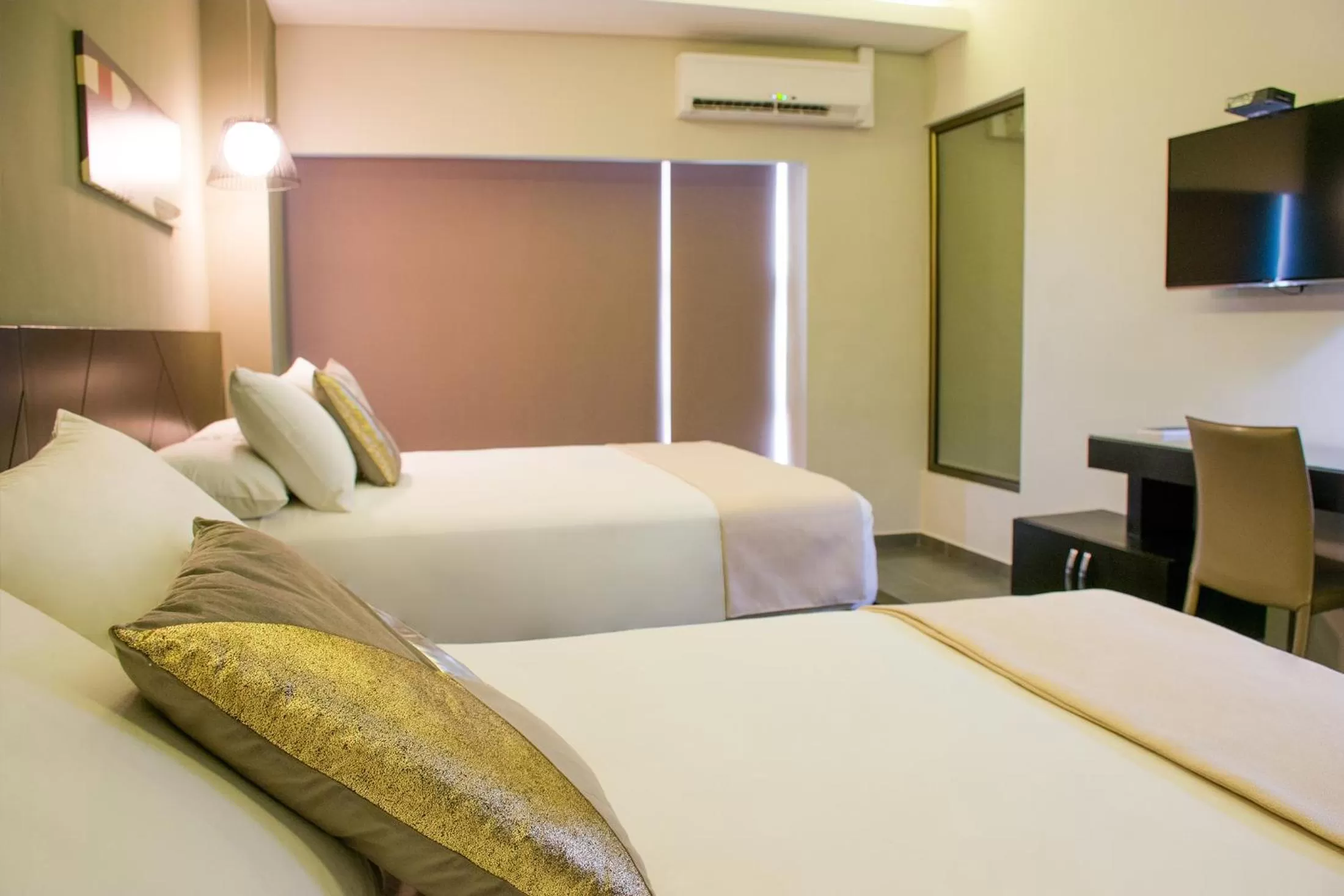 Bed in Remfort Hotel