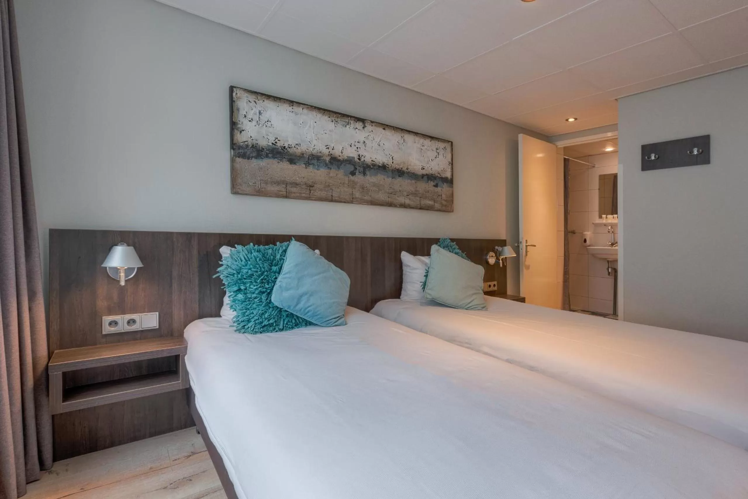 Bed in Hotel Damsquare