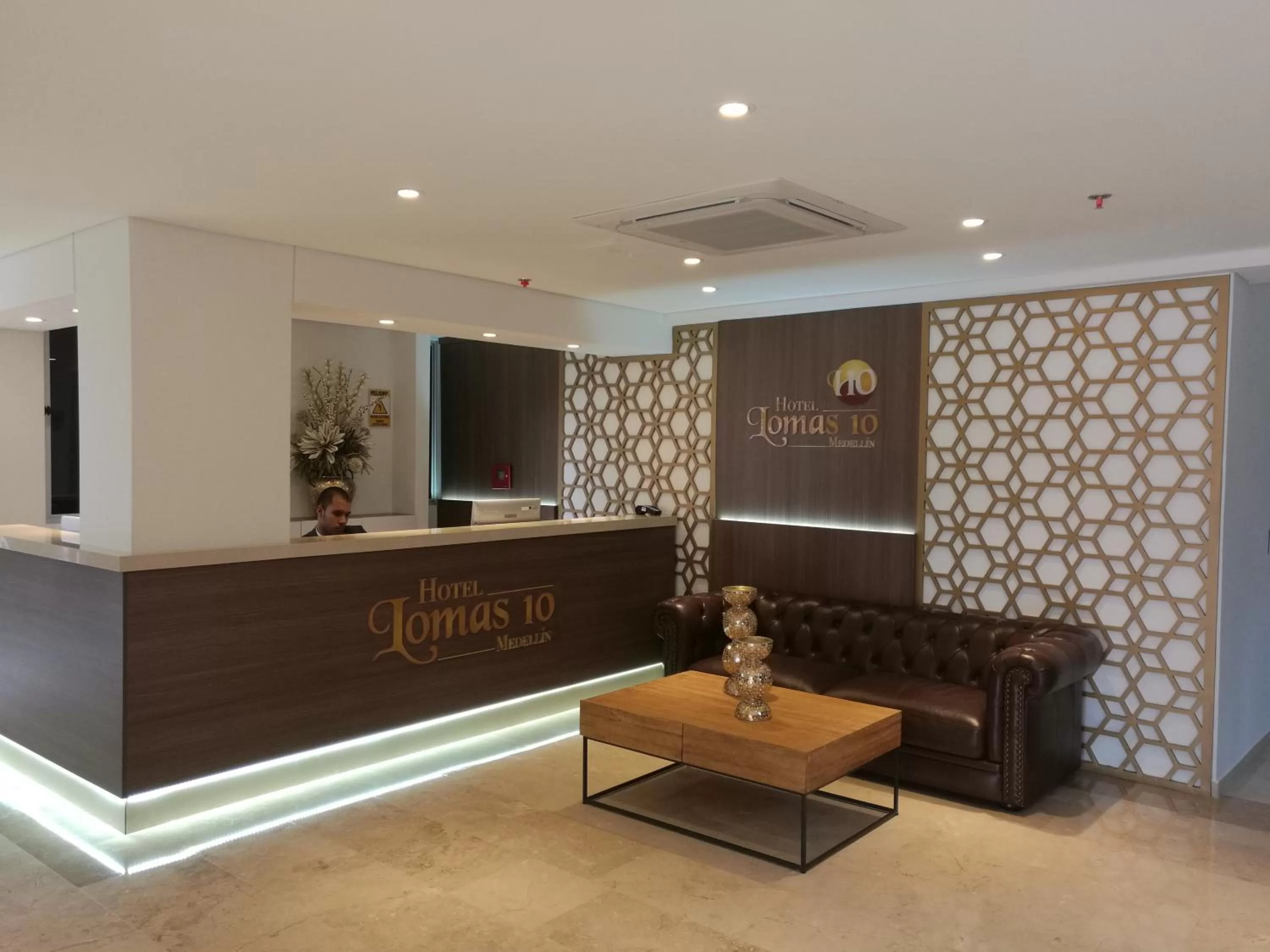 Property logo or sign in Hotel Lomas 10 Medellin