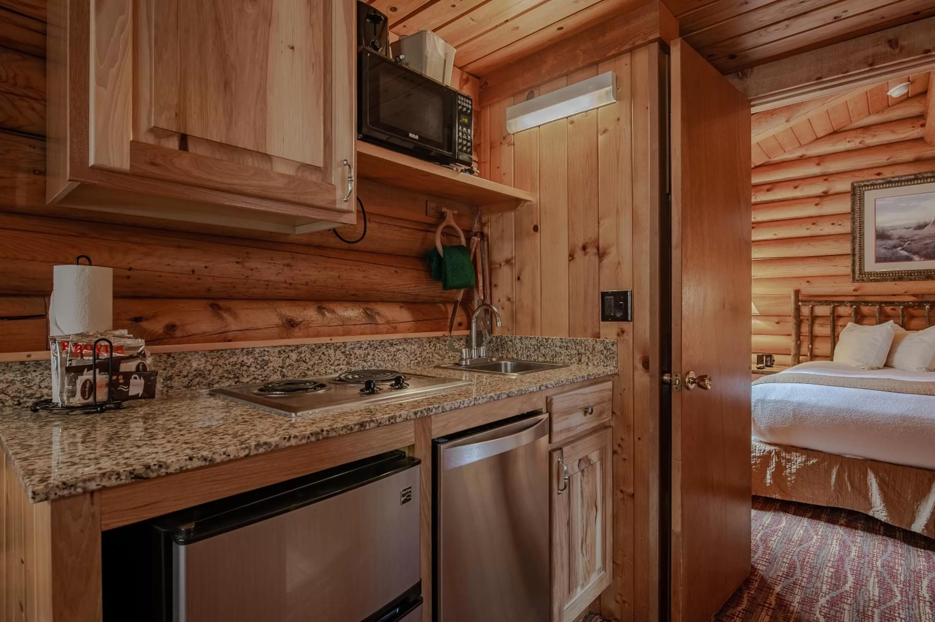Kitchen or kitchenette, Bed in Cowboy Village Resort