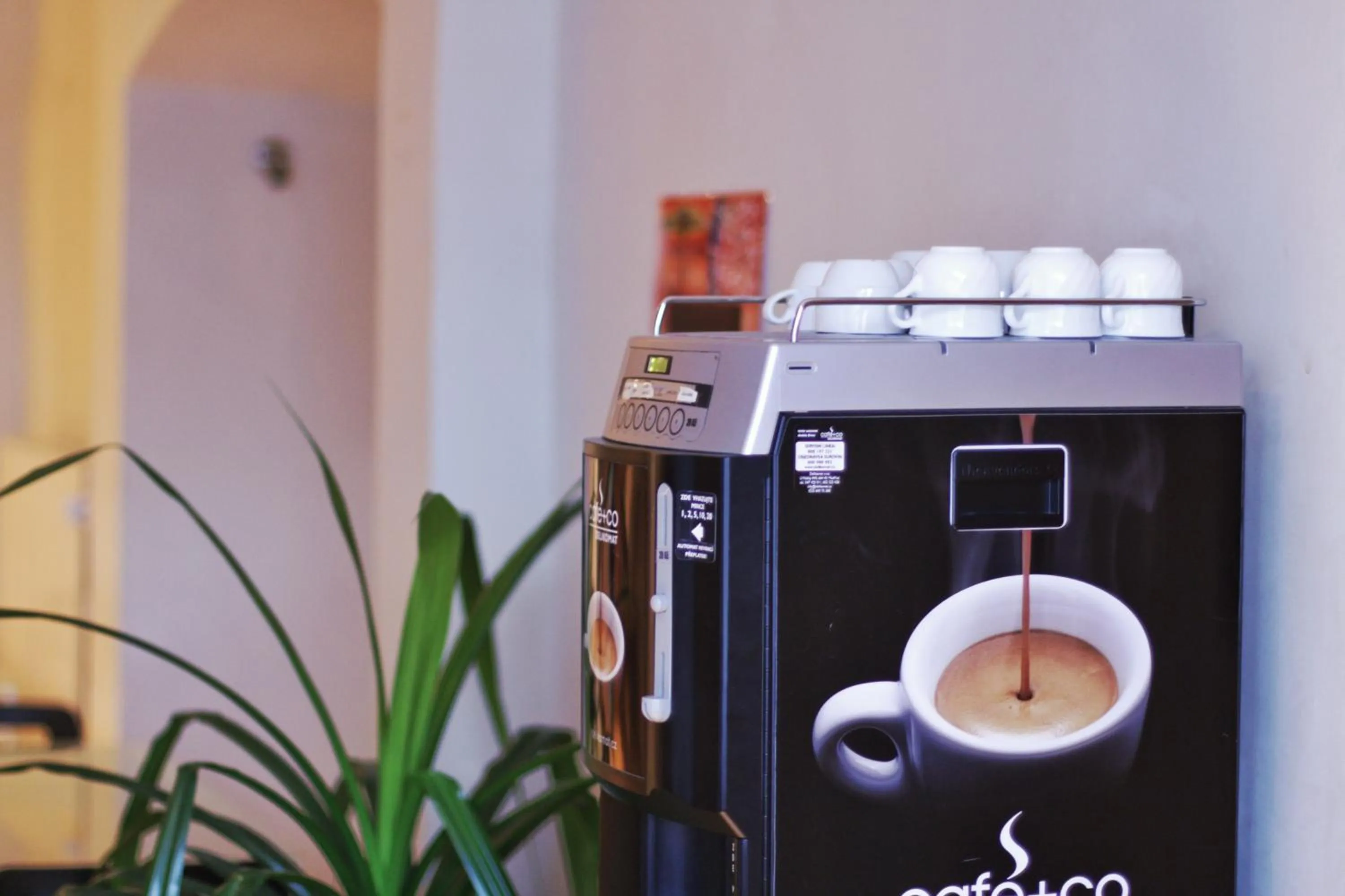 Communal lounge/ TV room in Hostel HOMEr - Old Town Square