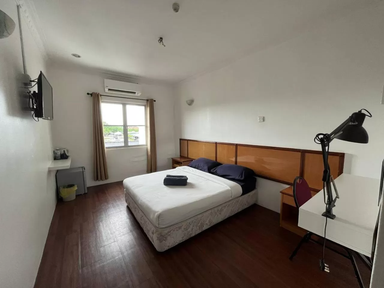 Bed in THE ZULEY HERITAGE HOTEL