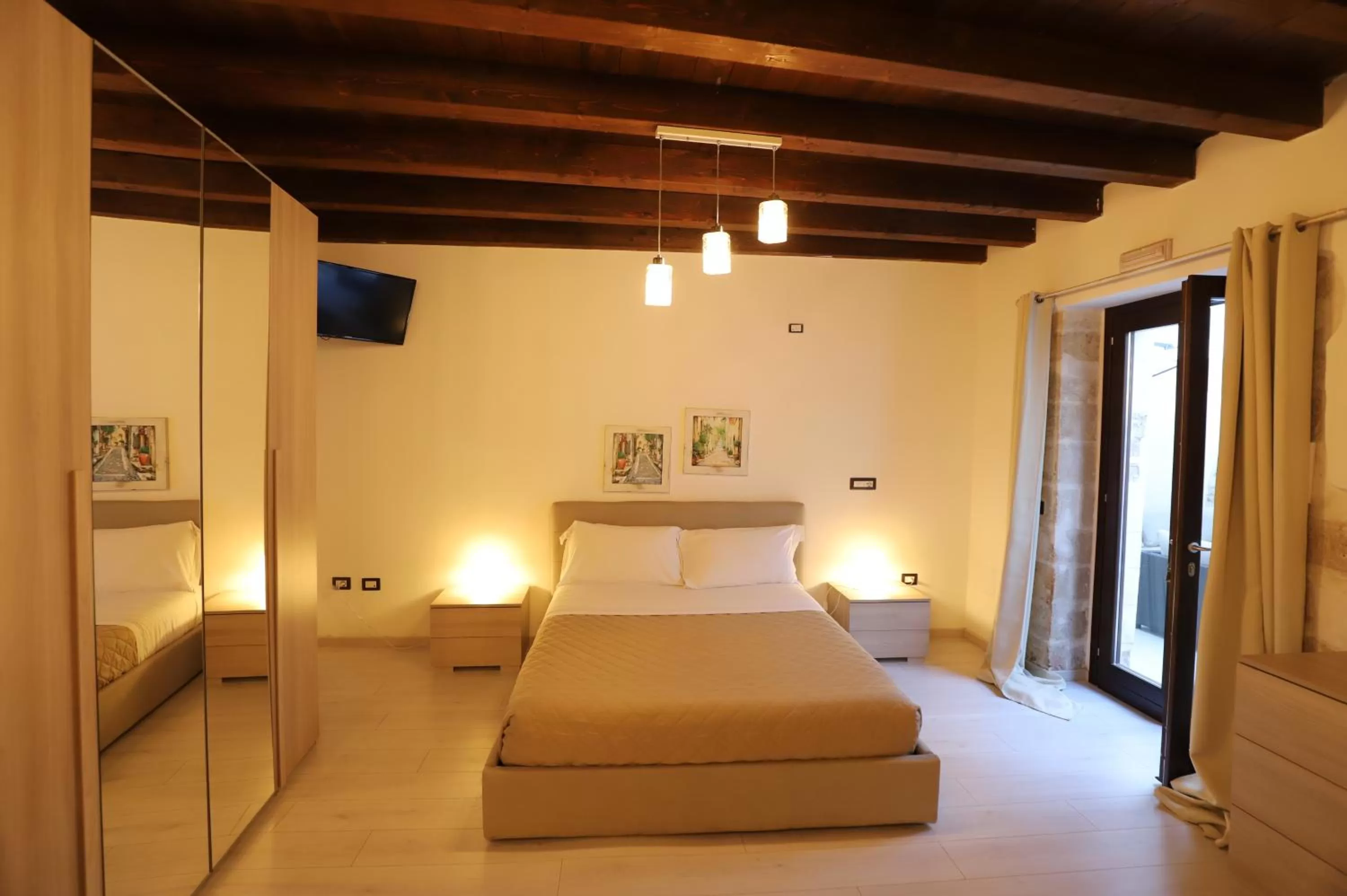 Bed in Italiana Resort Atrio