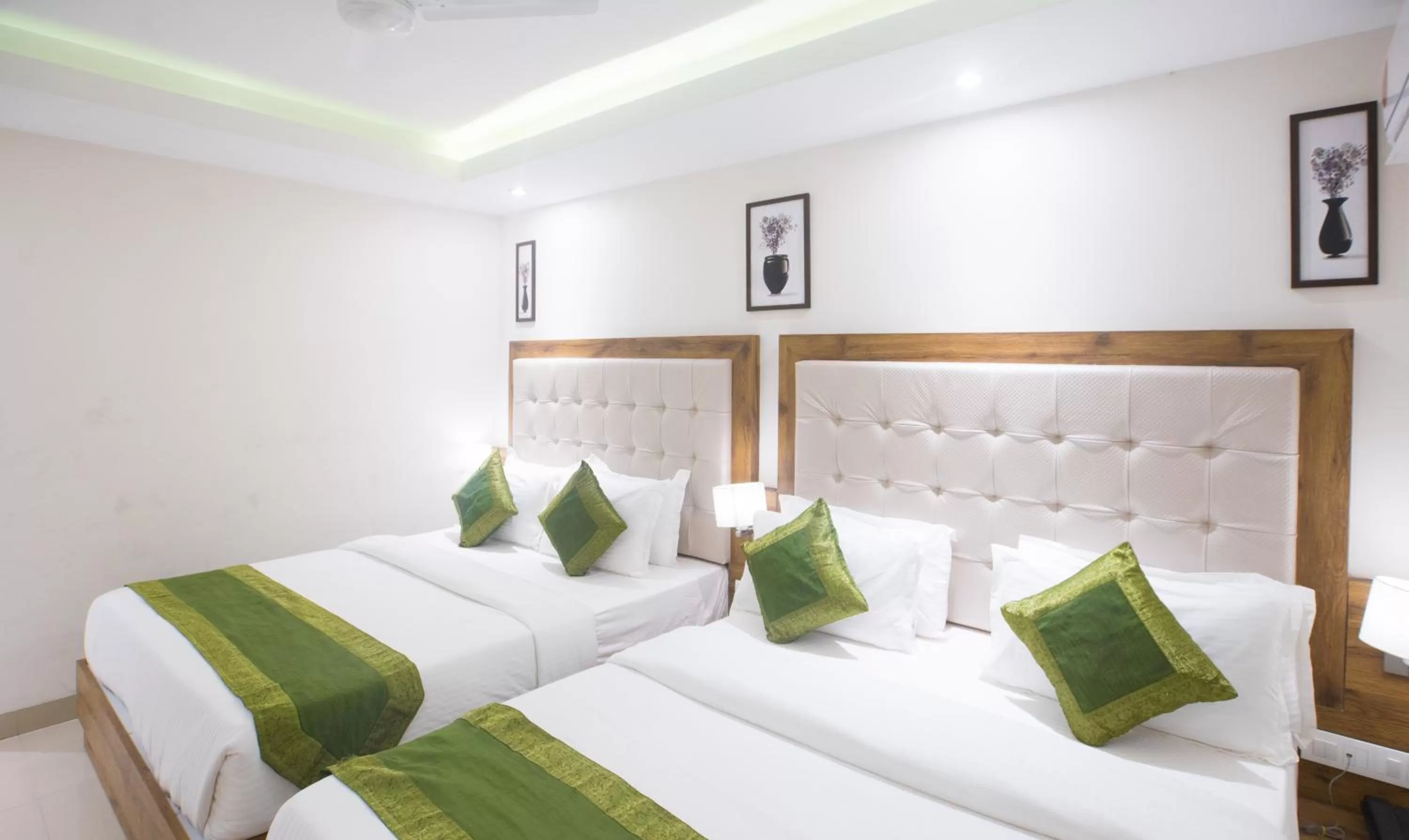 Bed in Treebo Amber International