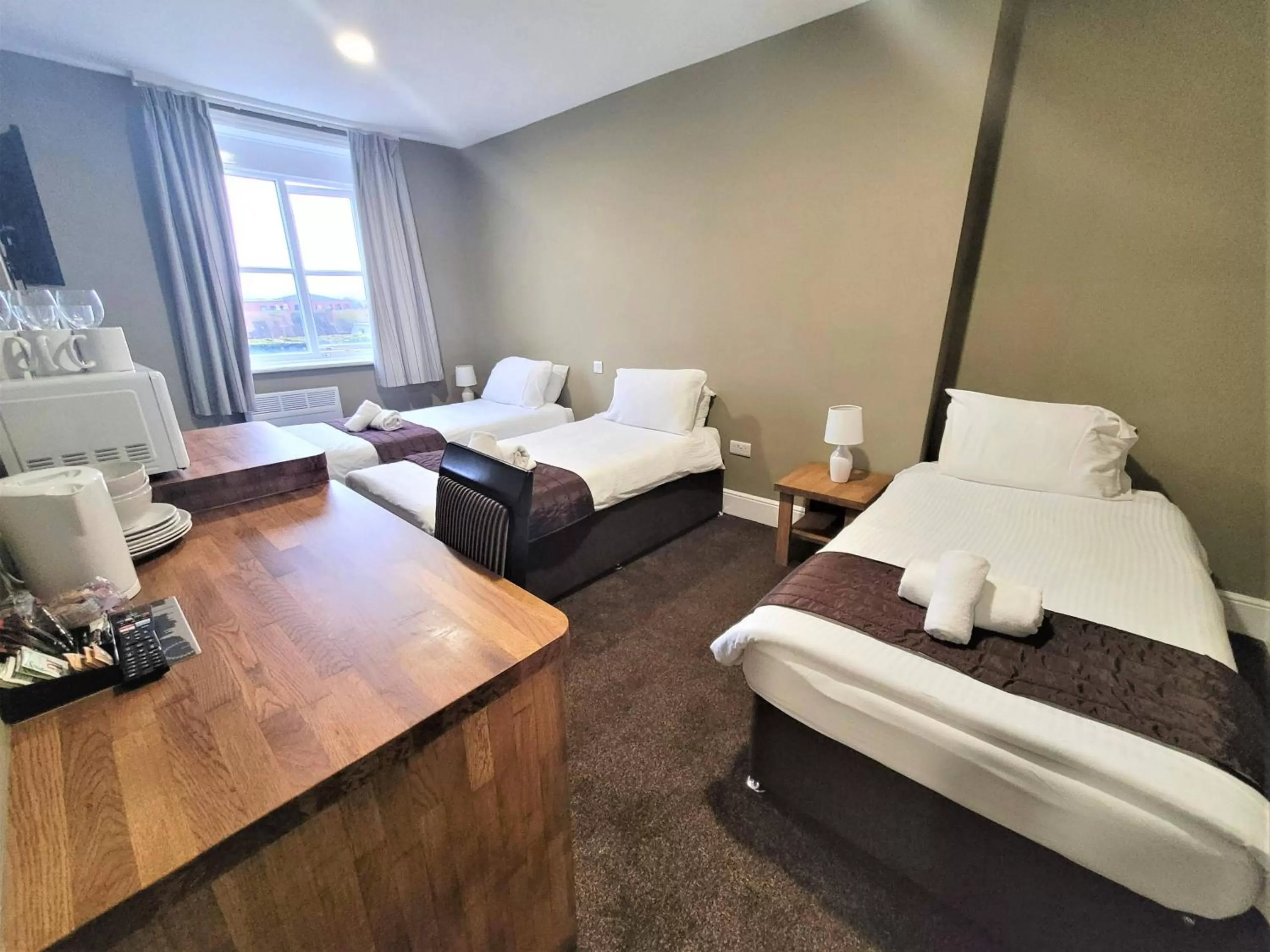 Bed in New County Hotel & Serviced Apartments by RoomsBooked