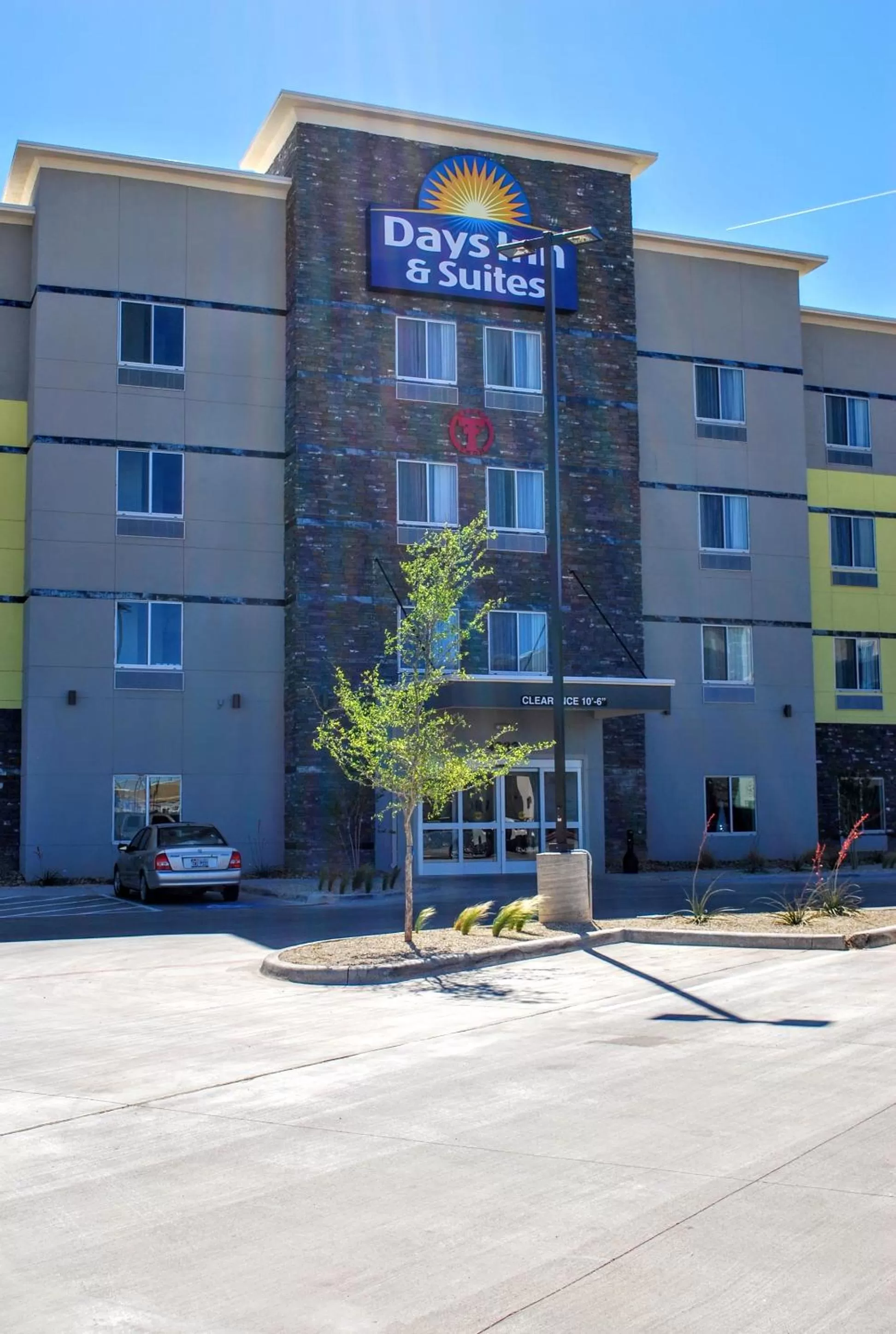 Property building in Days Inn & Suites by Wyndham Lubbock Medical Center