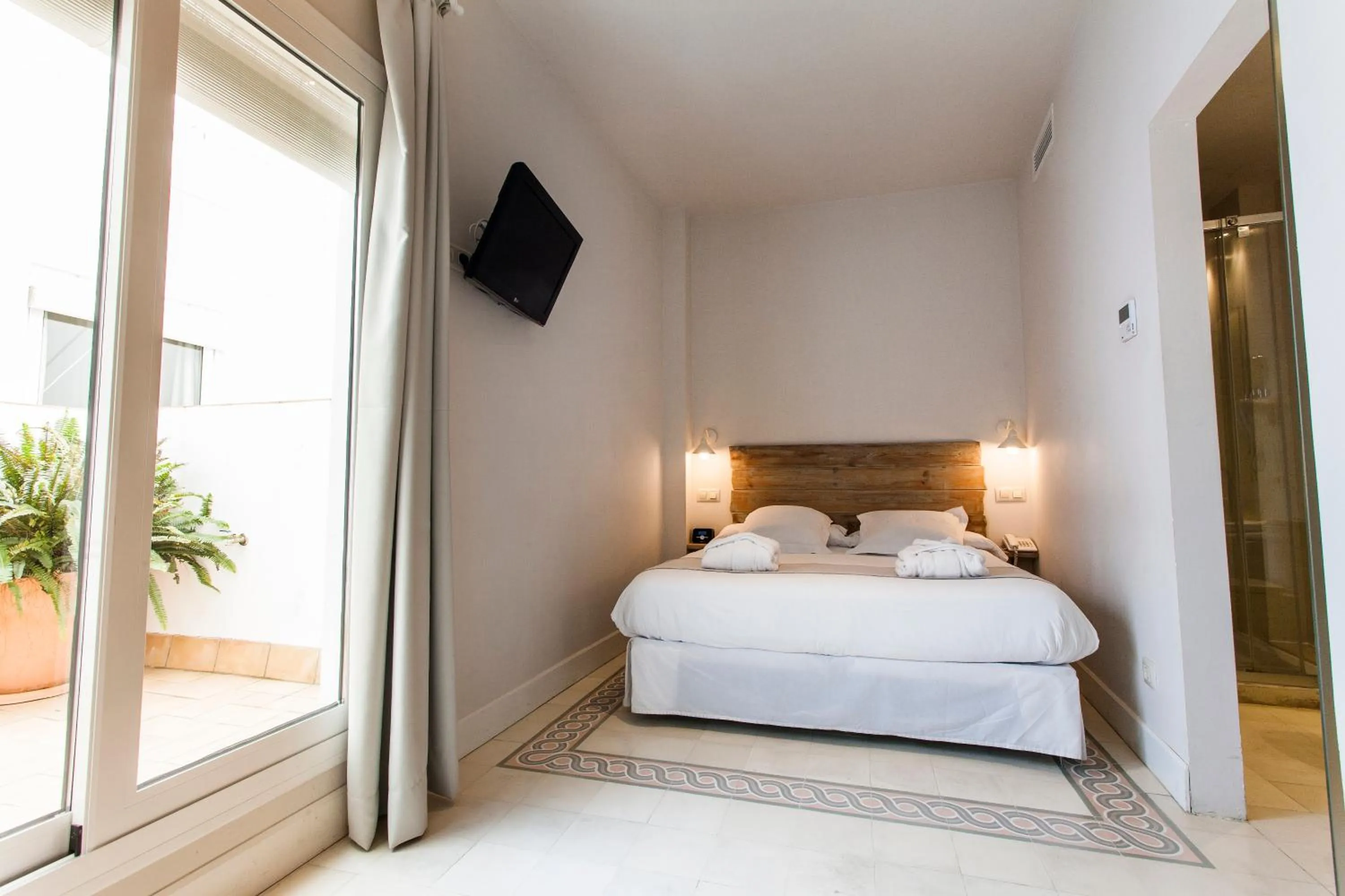 Bed in Hotel Boutique Elvira Plaza