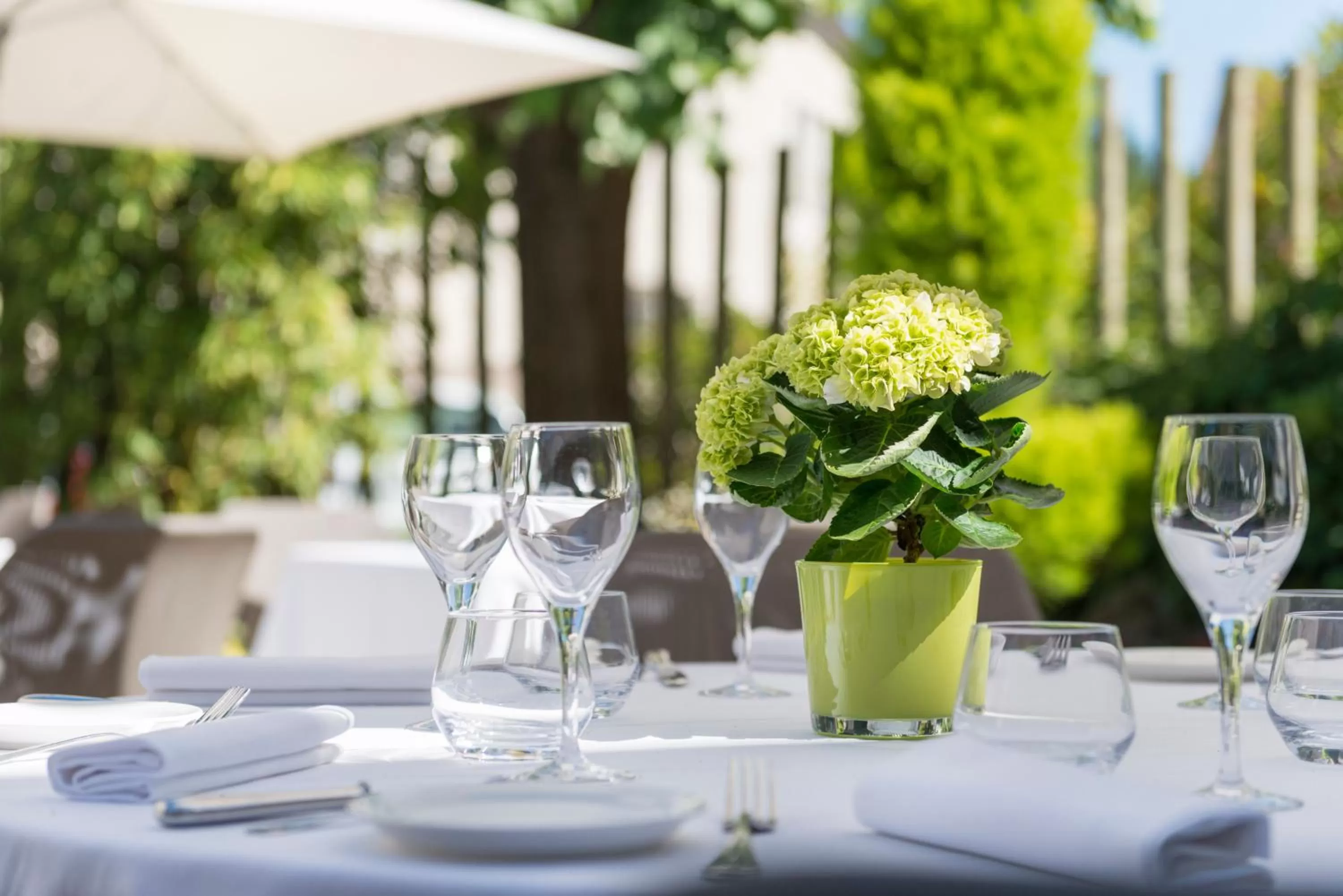 Patio in Hôtel Aux Vieux Remparts, The Originals Relais
