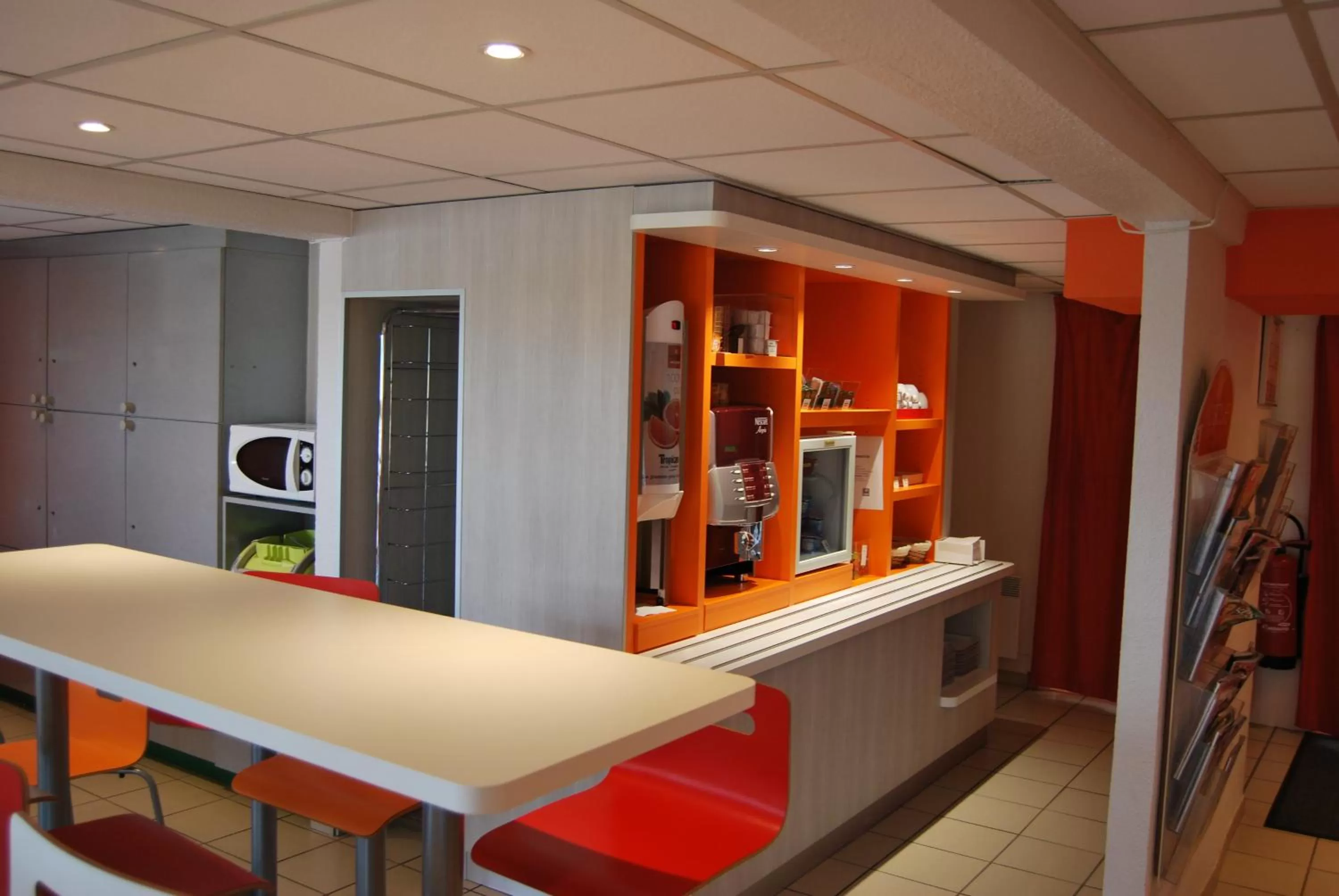 Dining area in Premiere Classe Vannes