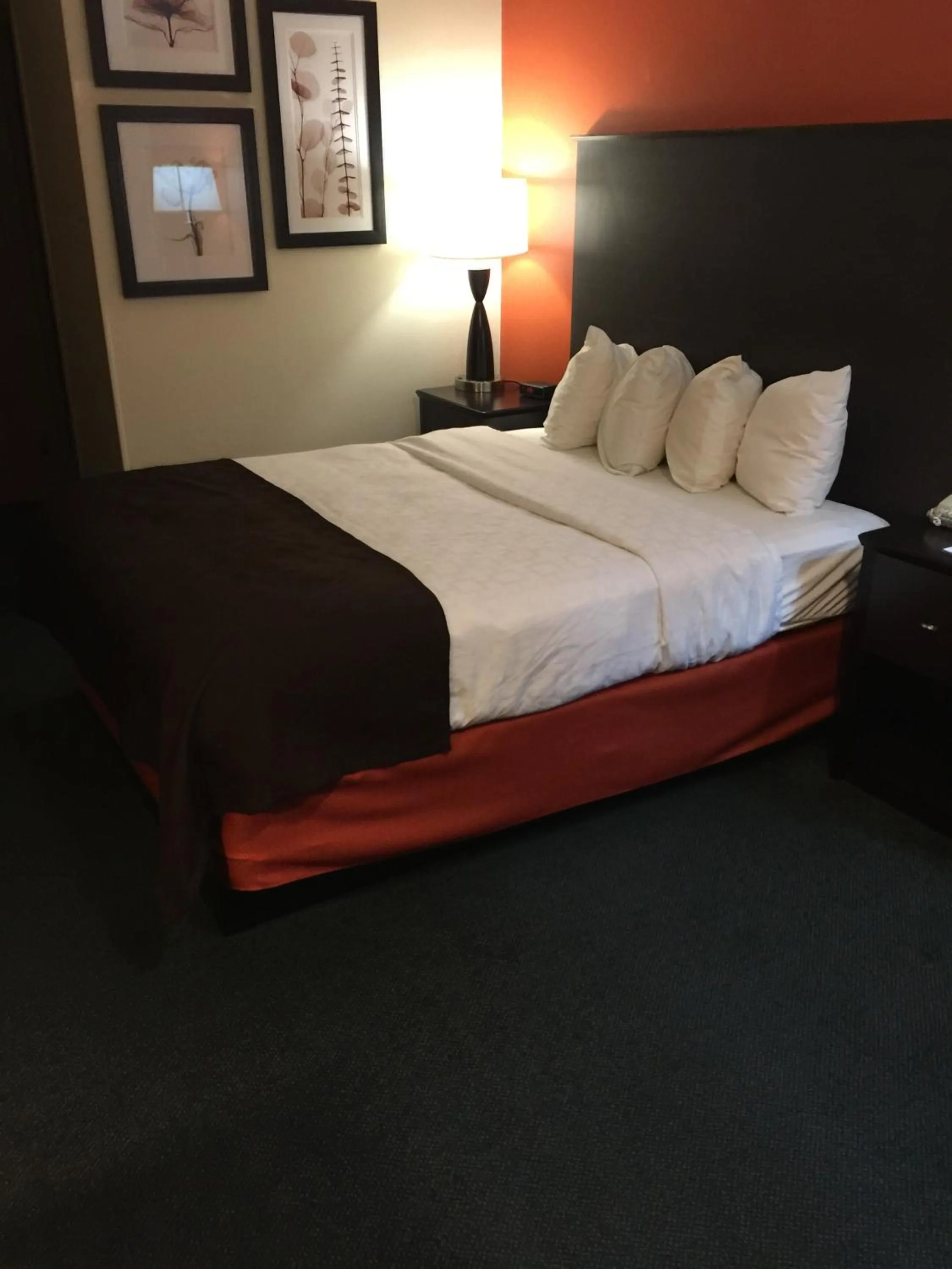 Bed in AmericInn by Wyndham Salina