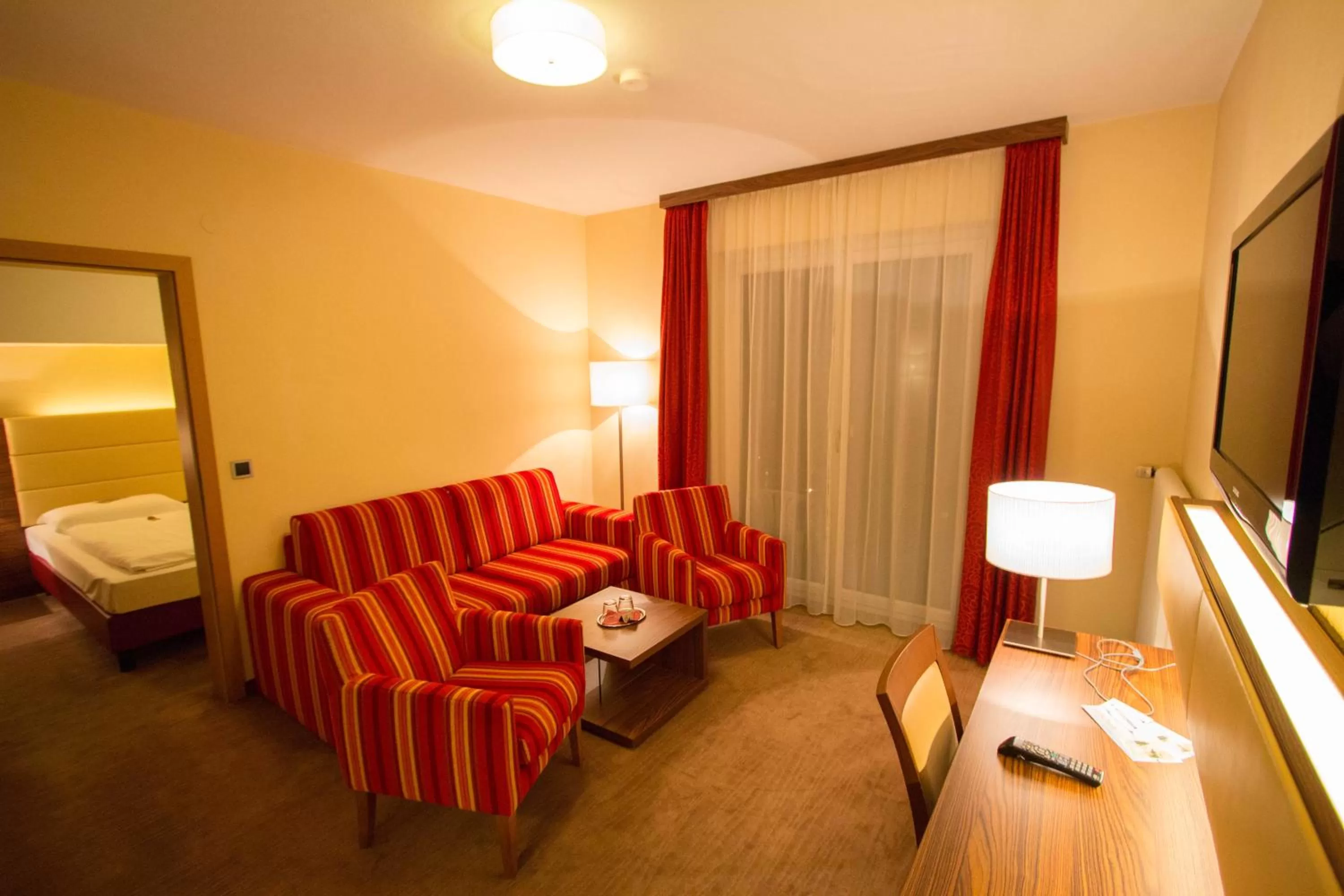 TV and multimedia, Seating Area in SCHÖNIS-Landhotel