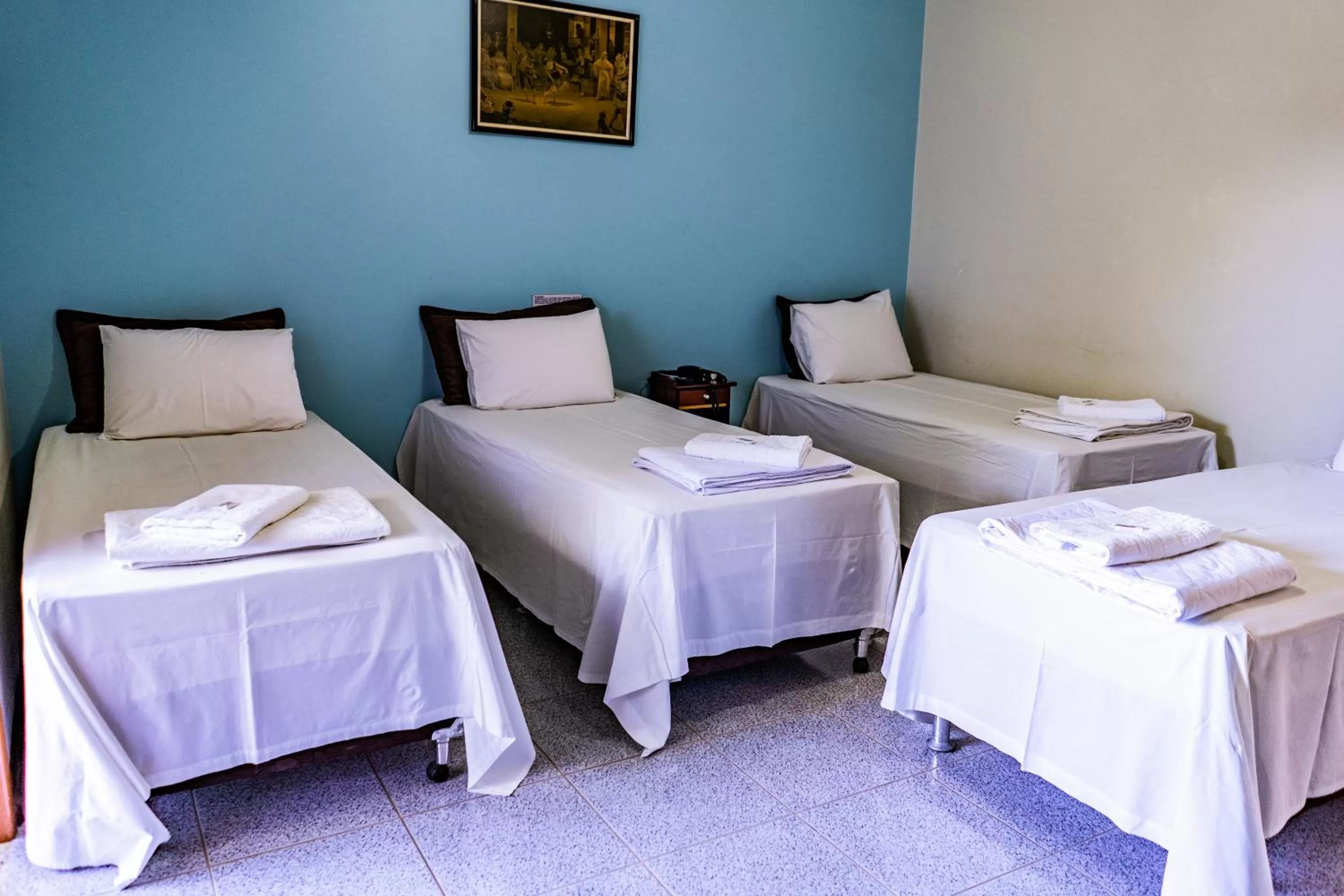 Bed in Pousada Paraiso