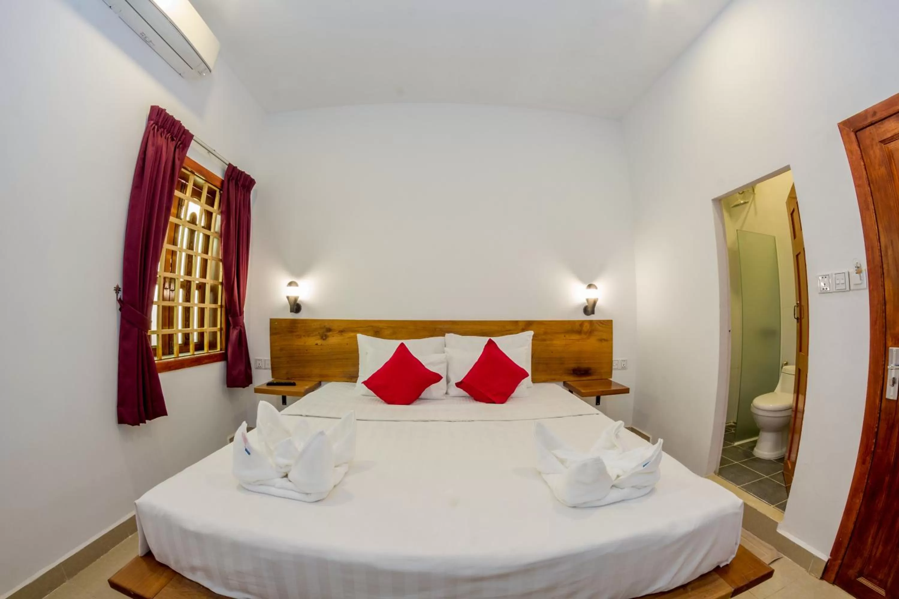 Bed in Poolside Villa