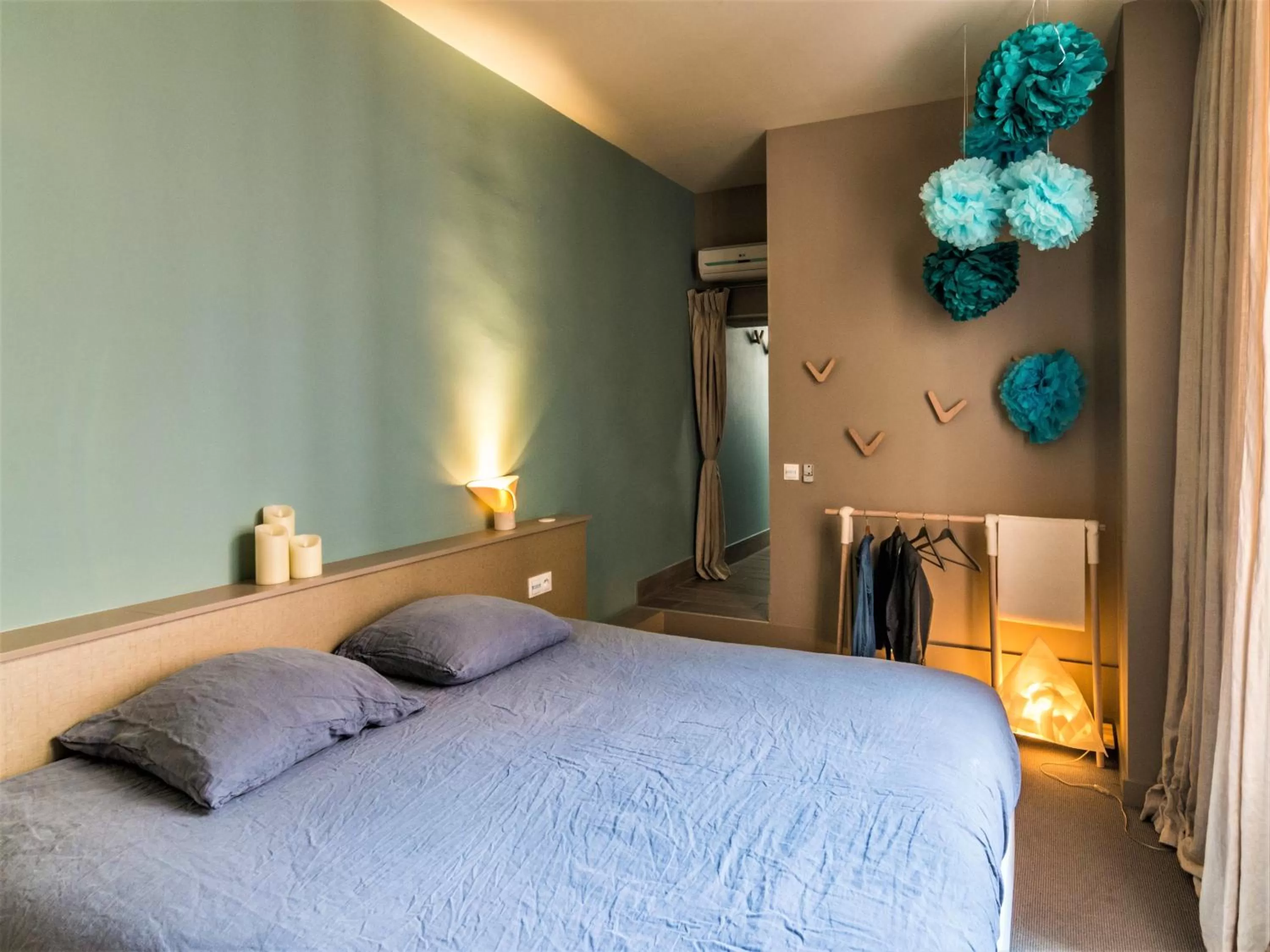 Bed in MiHotel Bellecour